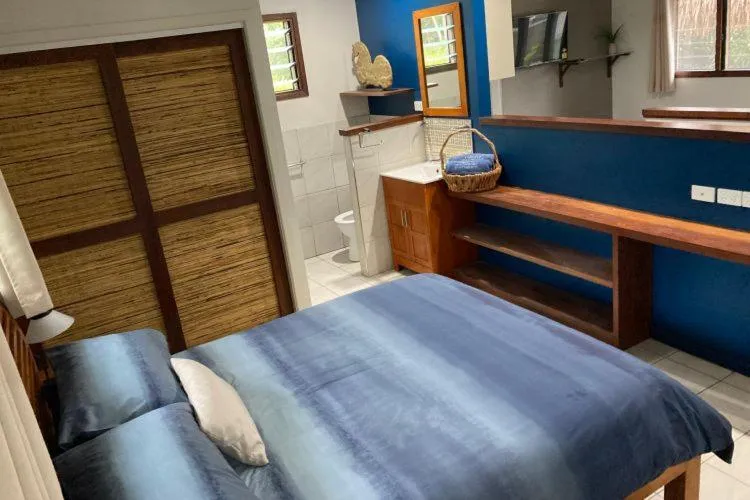 Bed in Vanuatu Beachfront Apartments