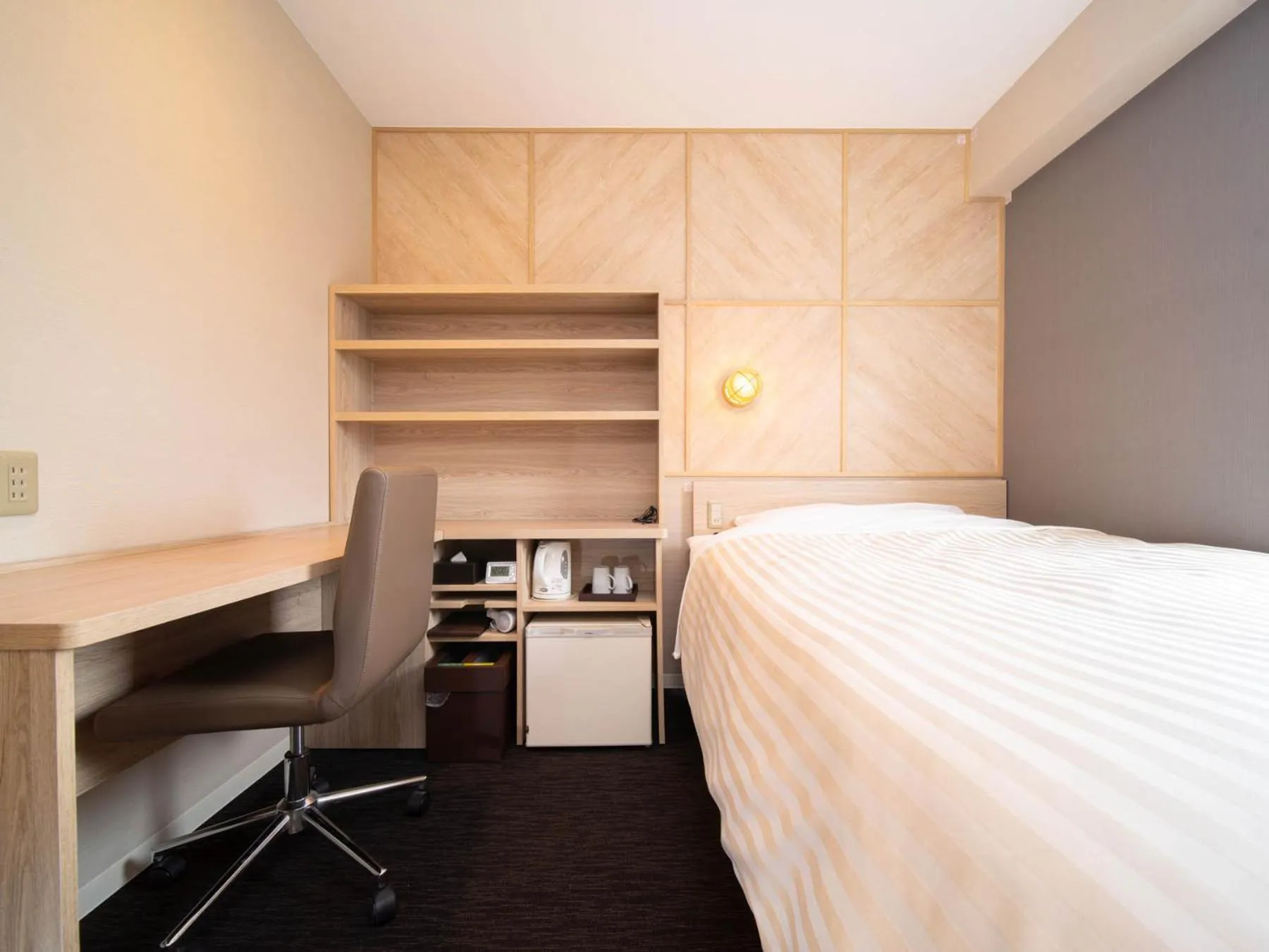 Bed in Super Hotel Nagaizumi Numazu Inter