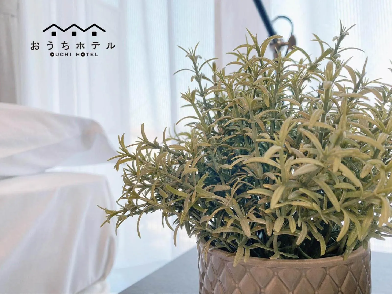 Bed in OUCHI HOTEL Hatsukaichi-Ekimae