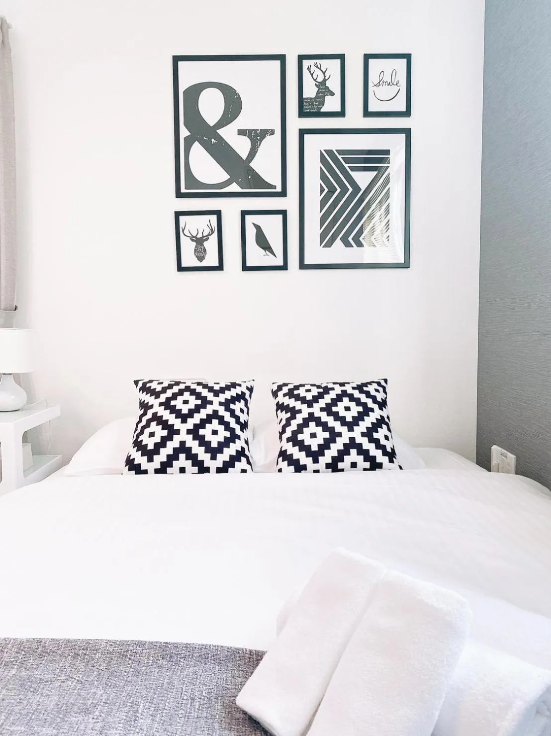 Bed in OUCHI HOTEL Hatsukaichi-Ekimae