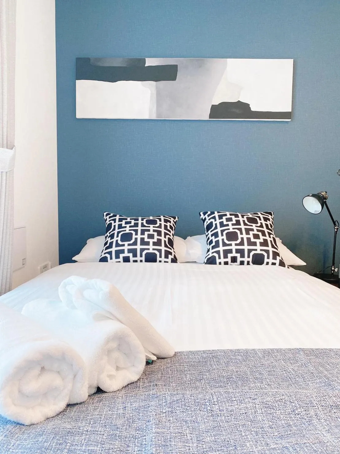 Bed in OUCHI HOTEL Hatsukaichi-Ekimae