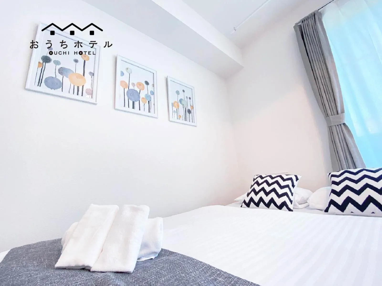 Bed in OUCHI HOTEL Miyajimaguchi