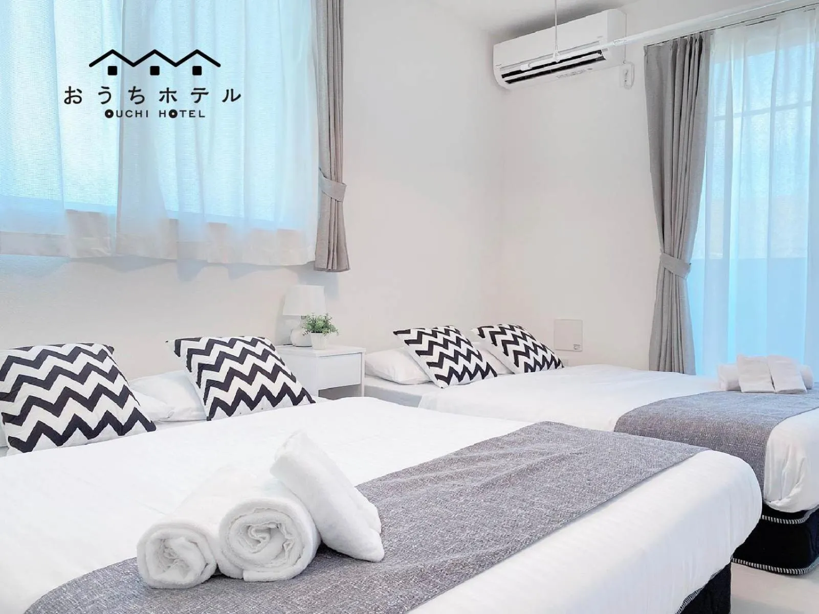 Bed in OUCHI HOTEL Miyajimaguchi