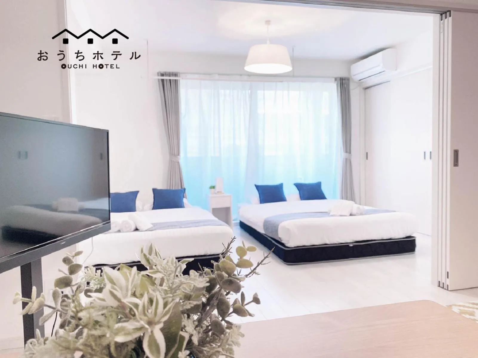 Bed in OUCHI HOTEL Miyajimaguchi