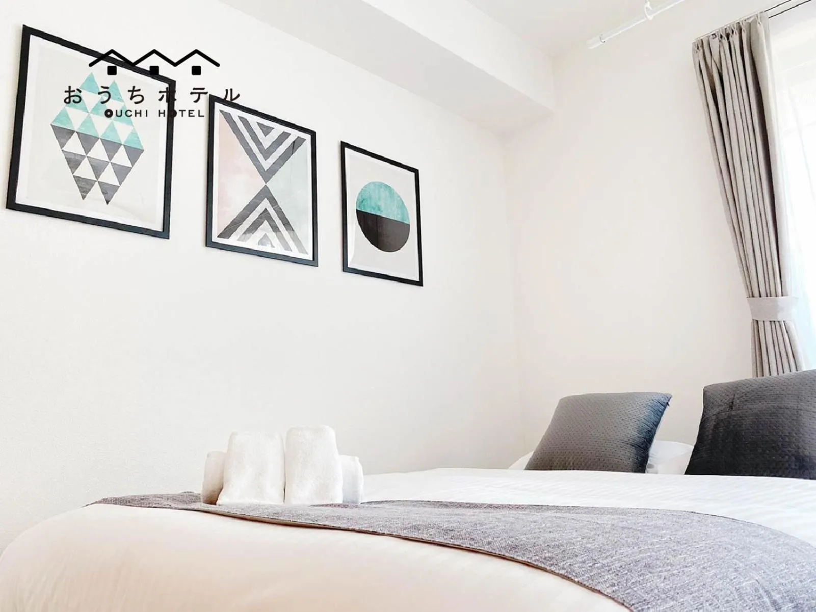 Bed in OUCHI HOTEL Miyajimaguchi