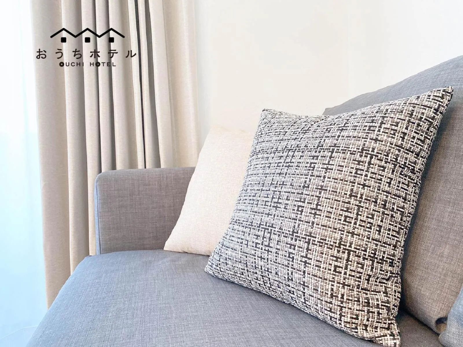 Bed in OUCHI HOTEL Miyajimaguchi