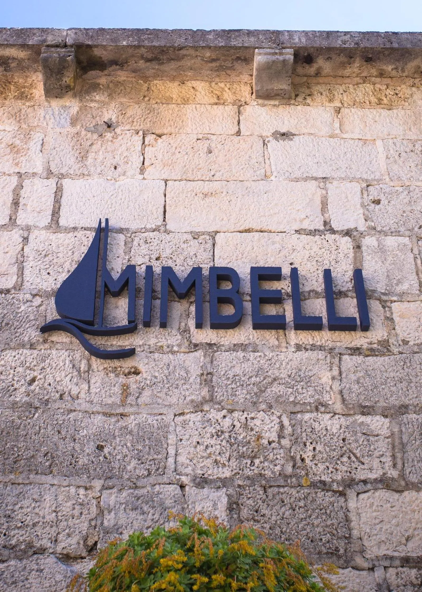 Property logo or sign in Guesthouse Mimbelli