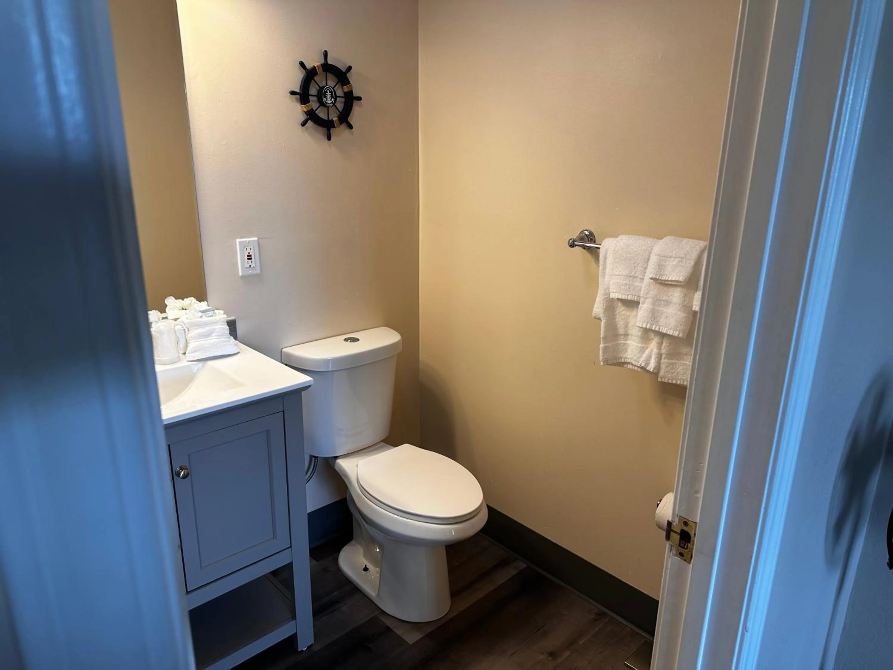 Toilet in Coastal Inn and Suites