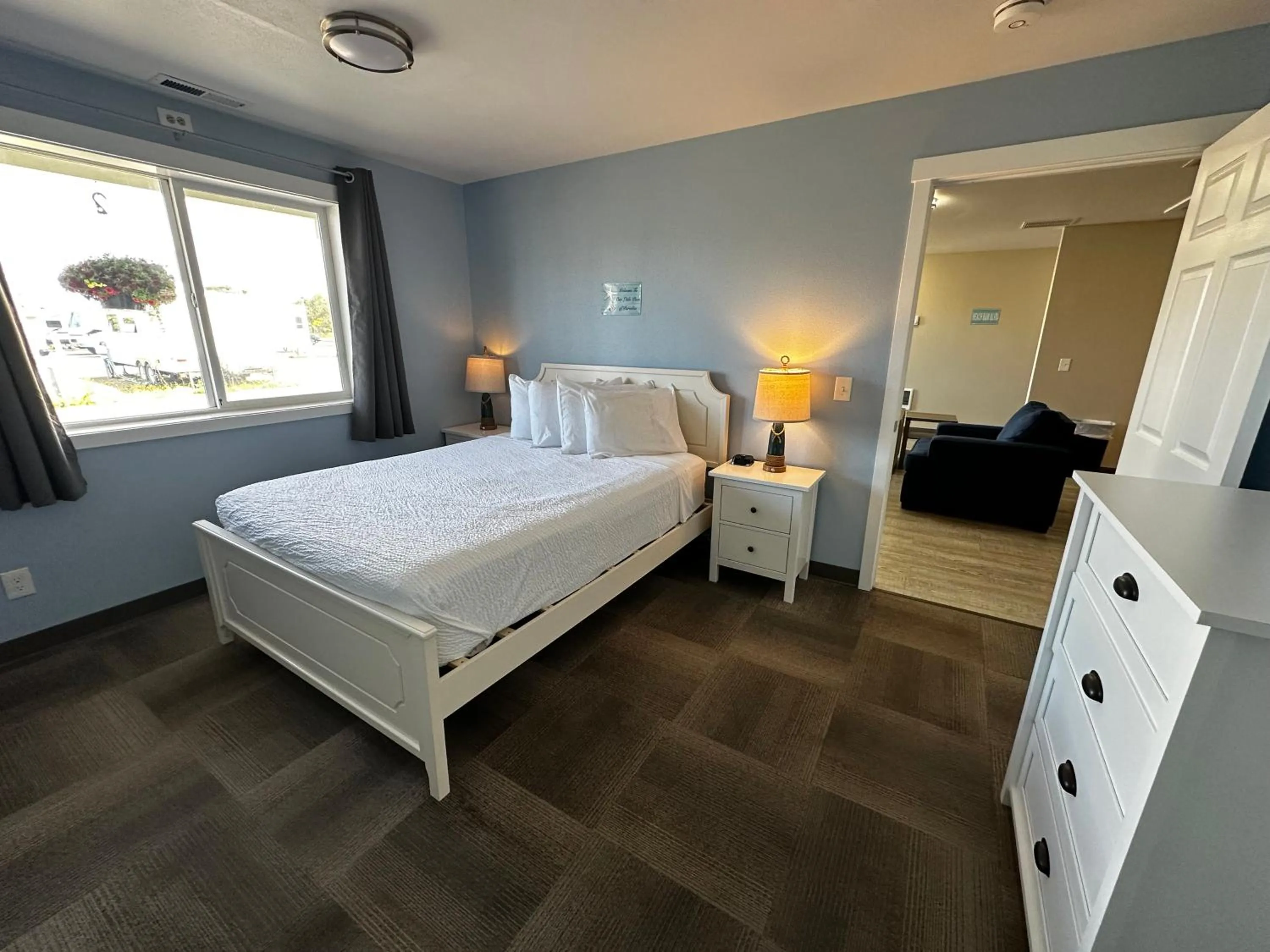 Bed in Coastal Inn and Suites