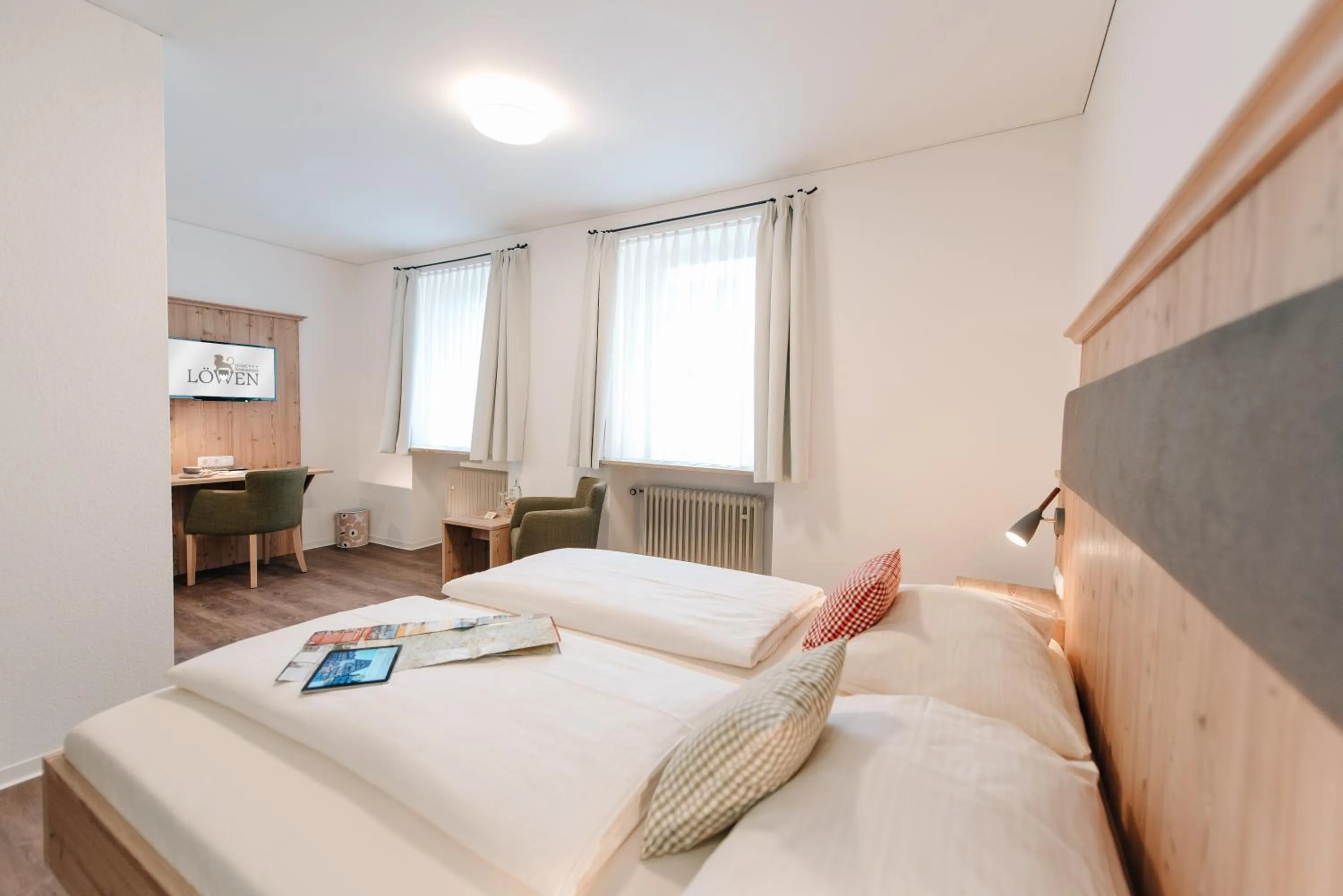 Photo of the whole room, Bed in Löwen Hotel & Restaurant