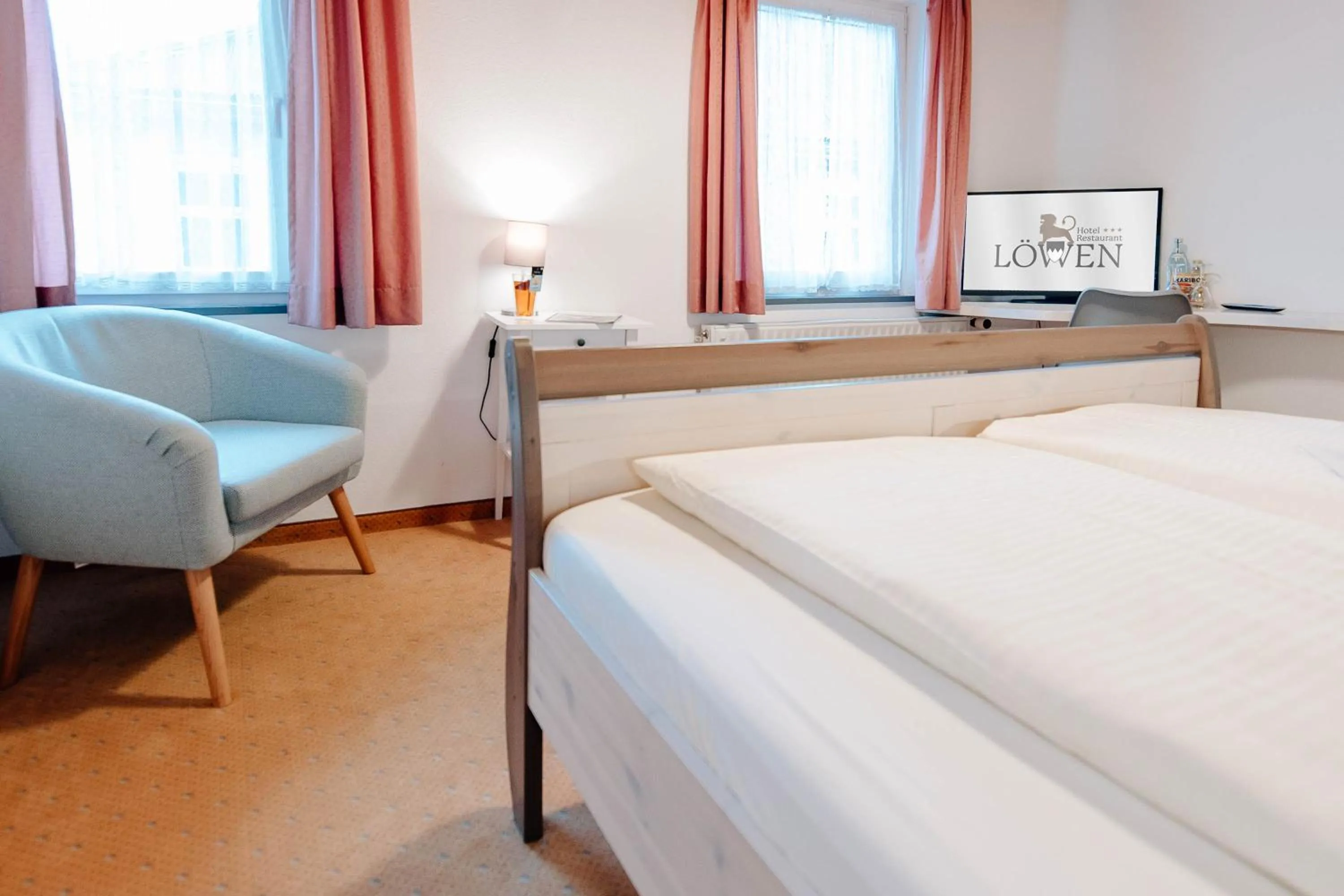 Photo of the whole room, Bed in Löwen Hotel & Restaurant