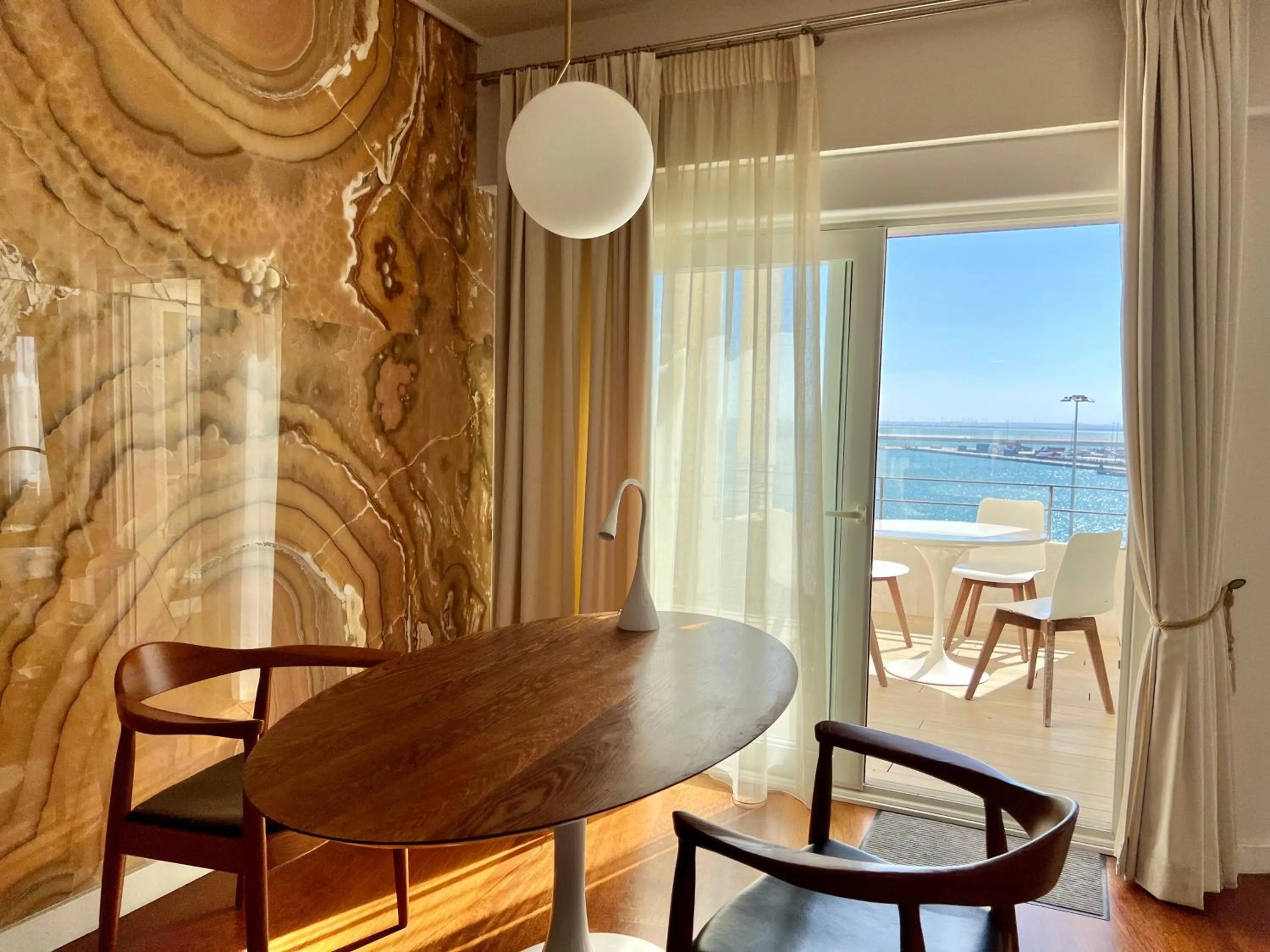 Dining area in Plaza Mina Suites - Adults Recommended by Luxury Suites Cadiz