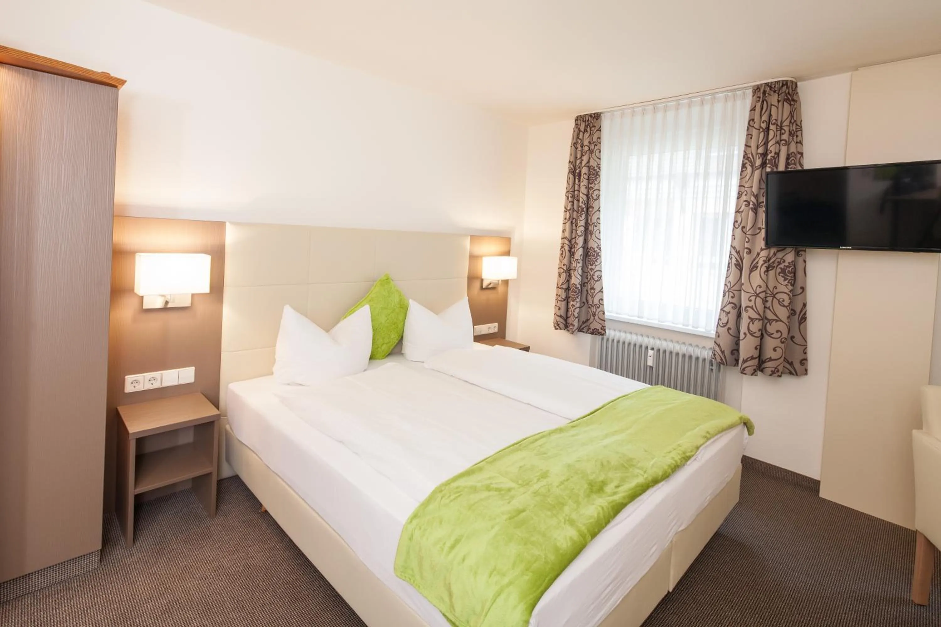 Photo of the whole room, Bed in City Hotel Freiburg