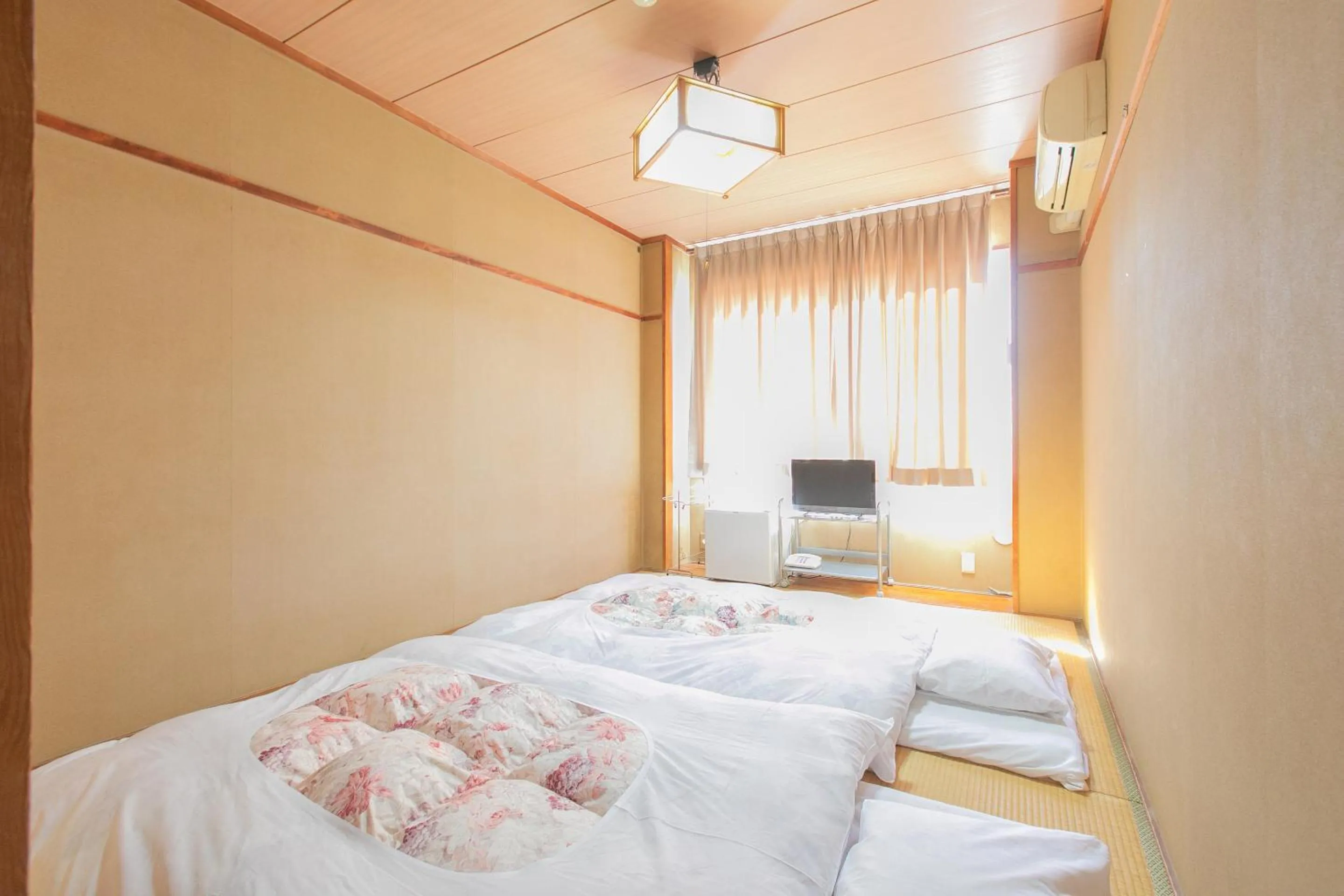 Photo of the whole room, Bed in Tabist Setouchinoyado Takehara Seaside