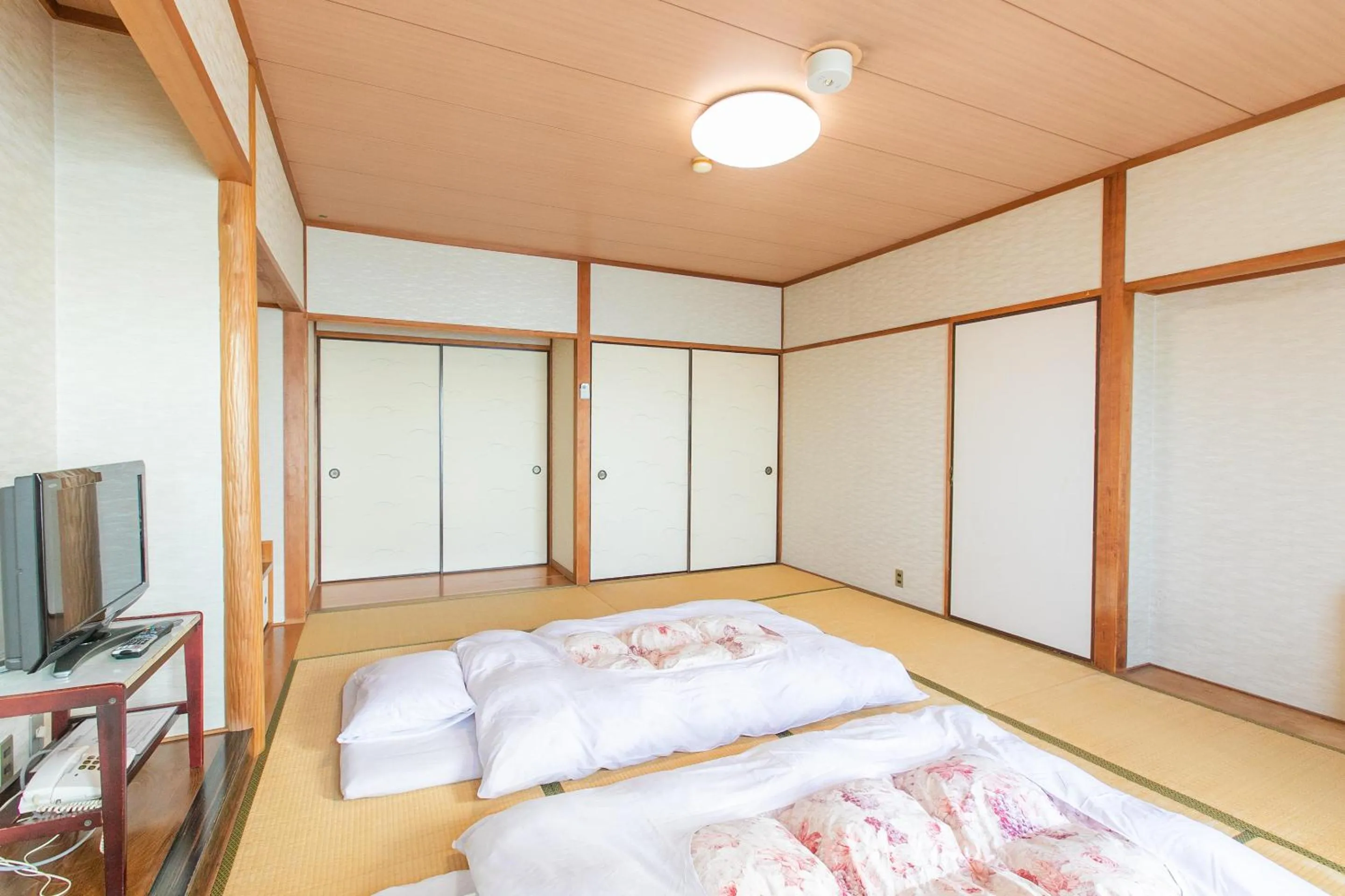 Photo of the whole room, Bed in Tabist Setouchinoyado Takehara Seaside