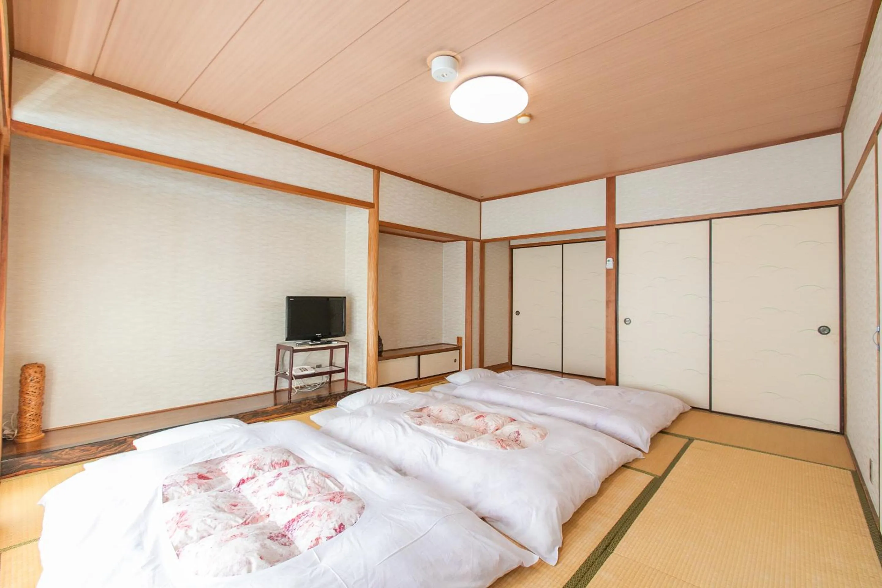 Photo of the whole room, Bed in Tabist Setouchinoyado Takehara Seaside
