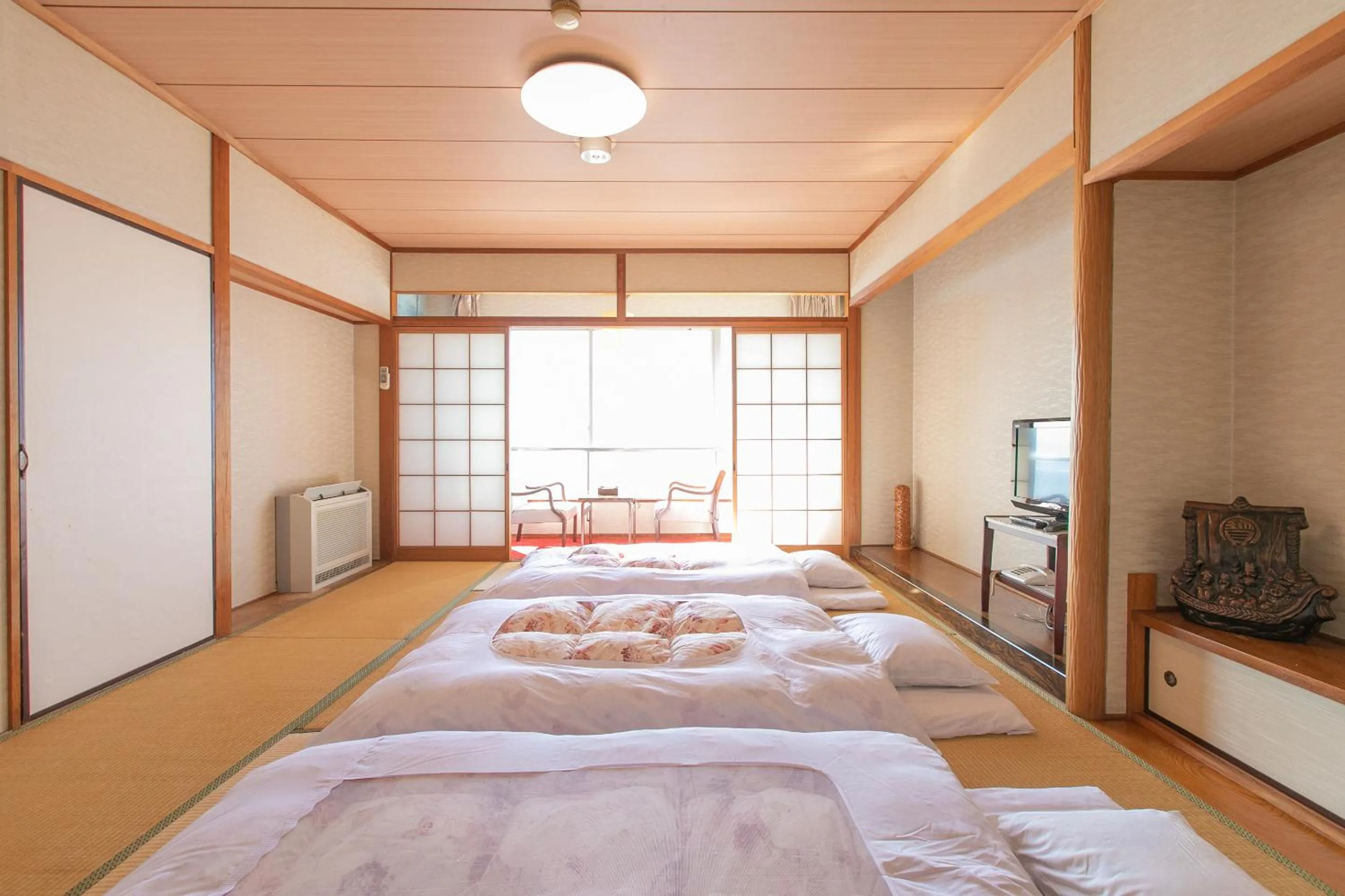 Photo of the whole room, Bed in Tabist Setouchinoyado Takehara Seaside