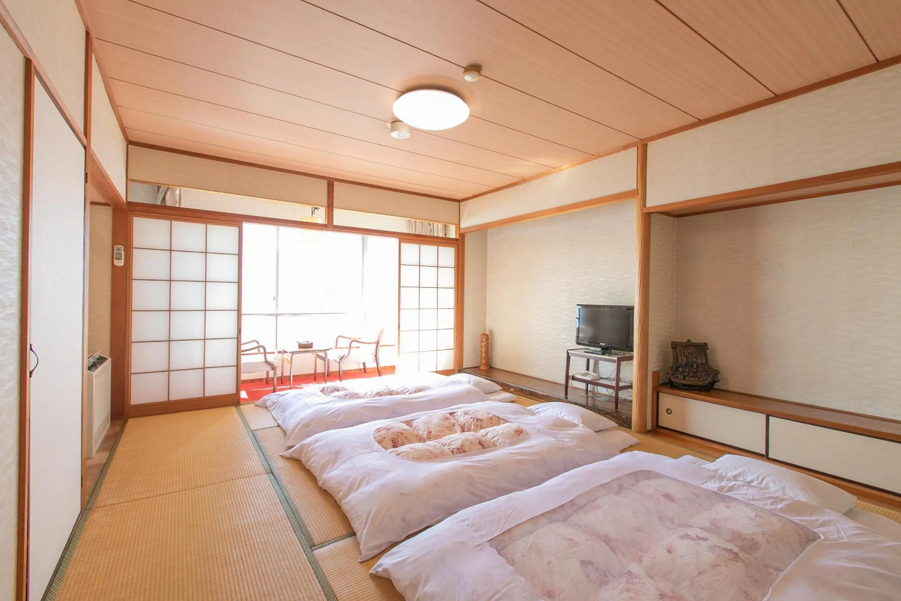 Photo of the whole room, Bed in Tabist Setouchinoyado Takehara Seaside