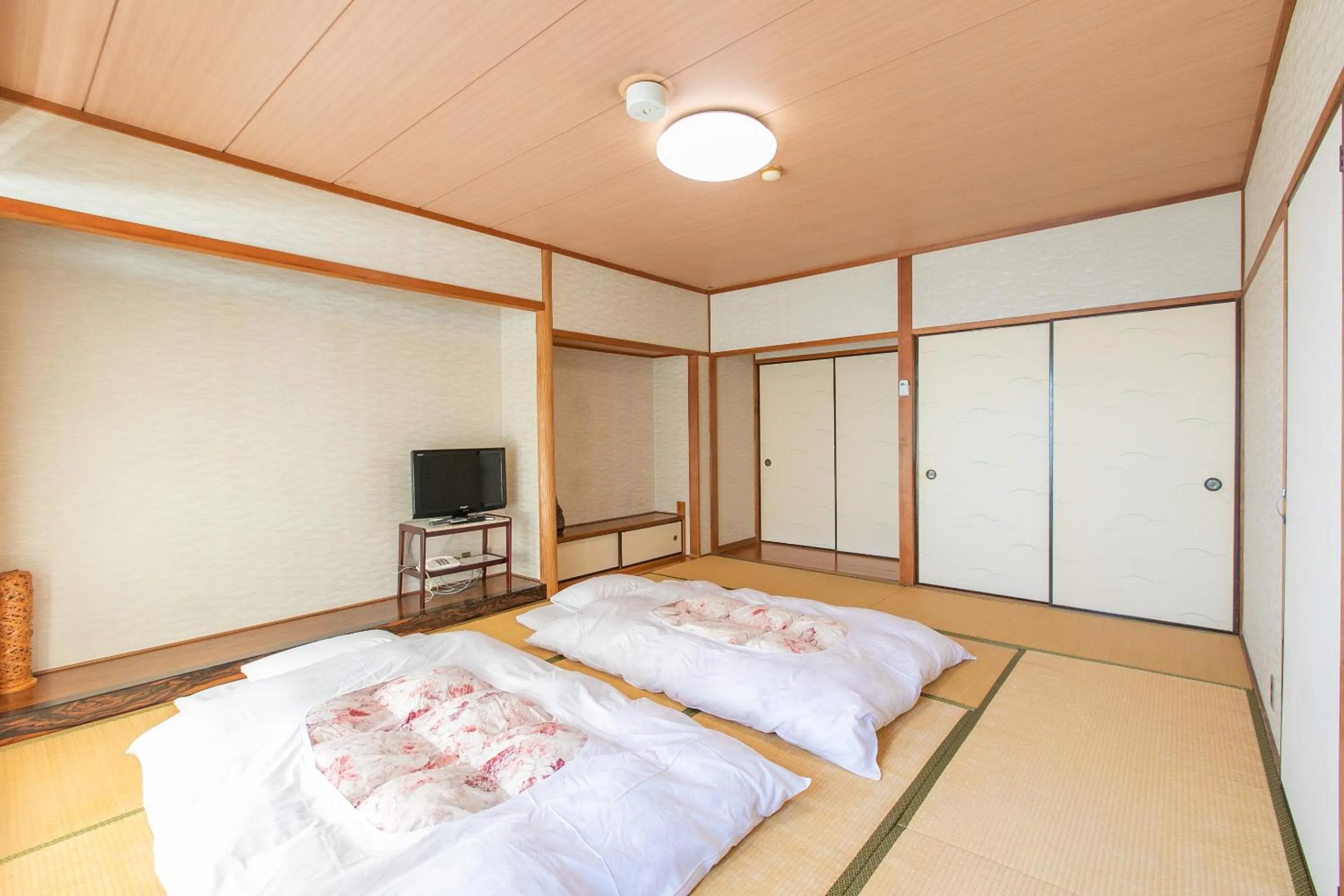 Photo of the whole room, Bed in Tabist Setouchinoyado Takehara Seaside