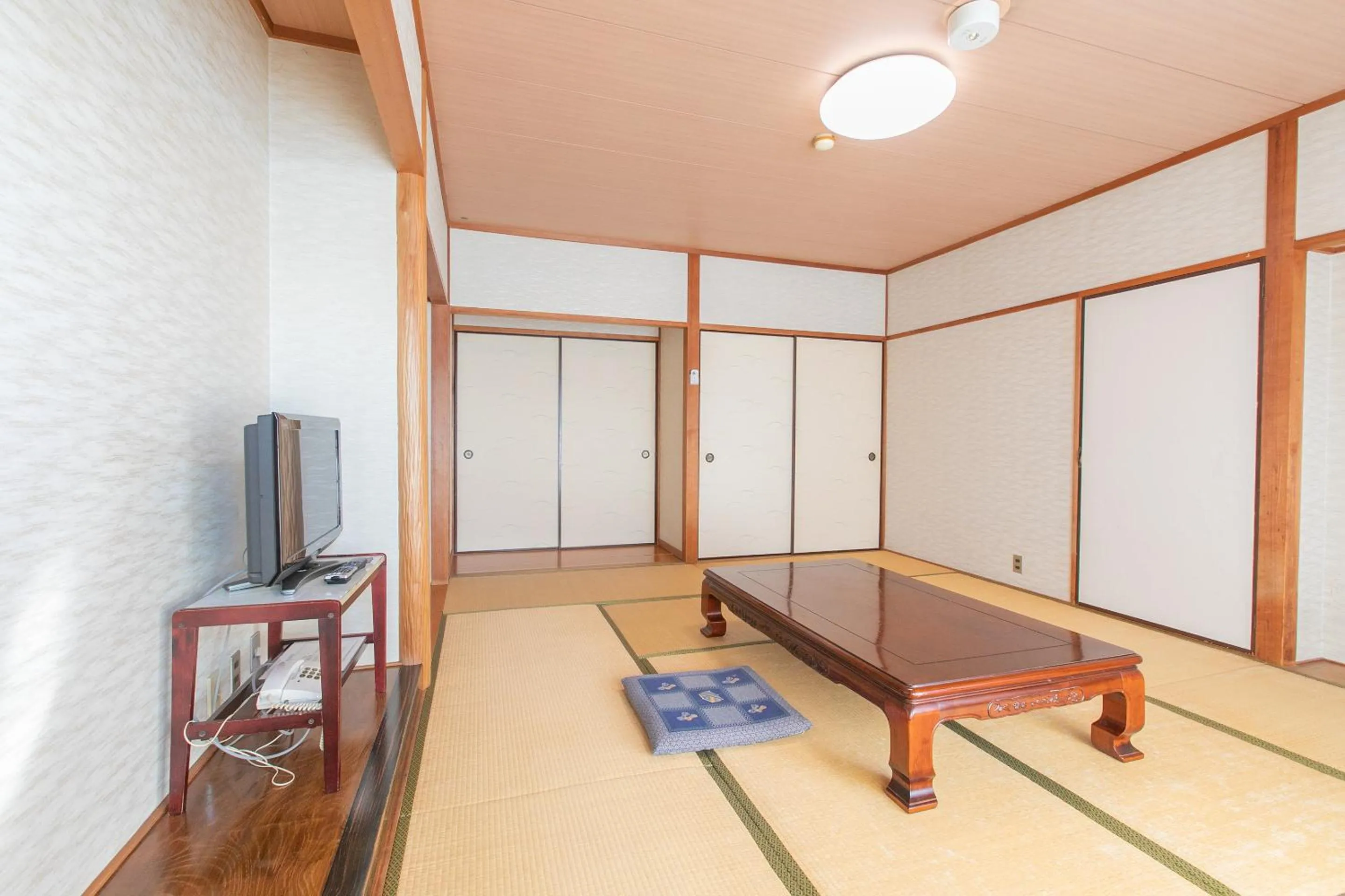 Photo of the whole room in Tabist Setouchinoyado Takehara Seaside