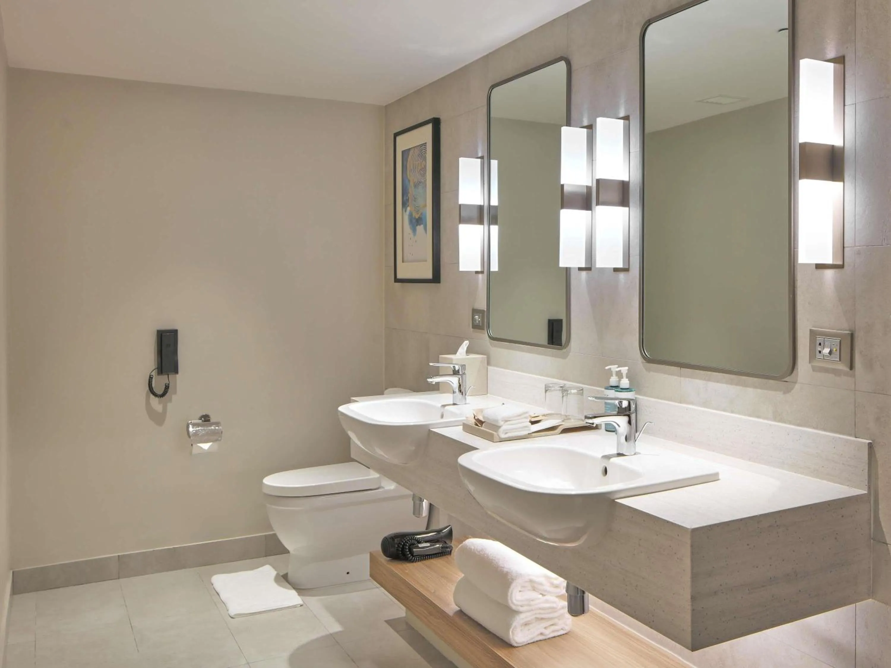 Bedroom in Novotel Suites Manila at Acqua