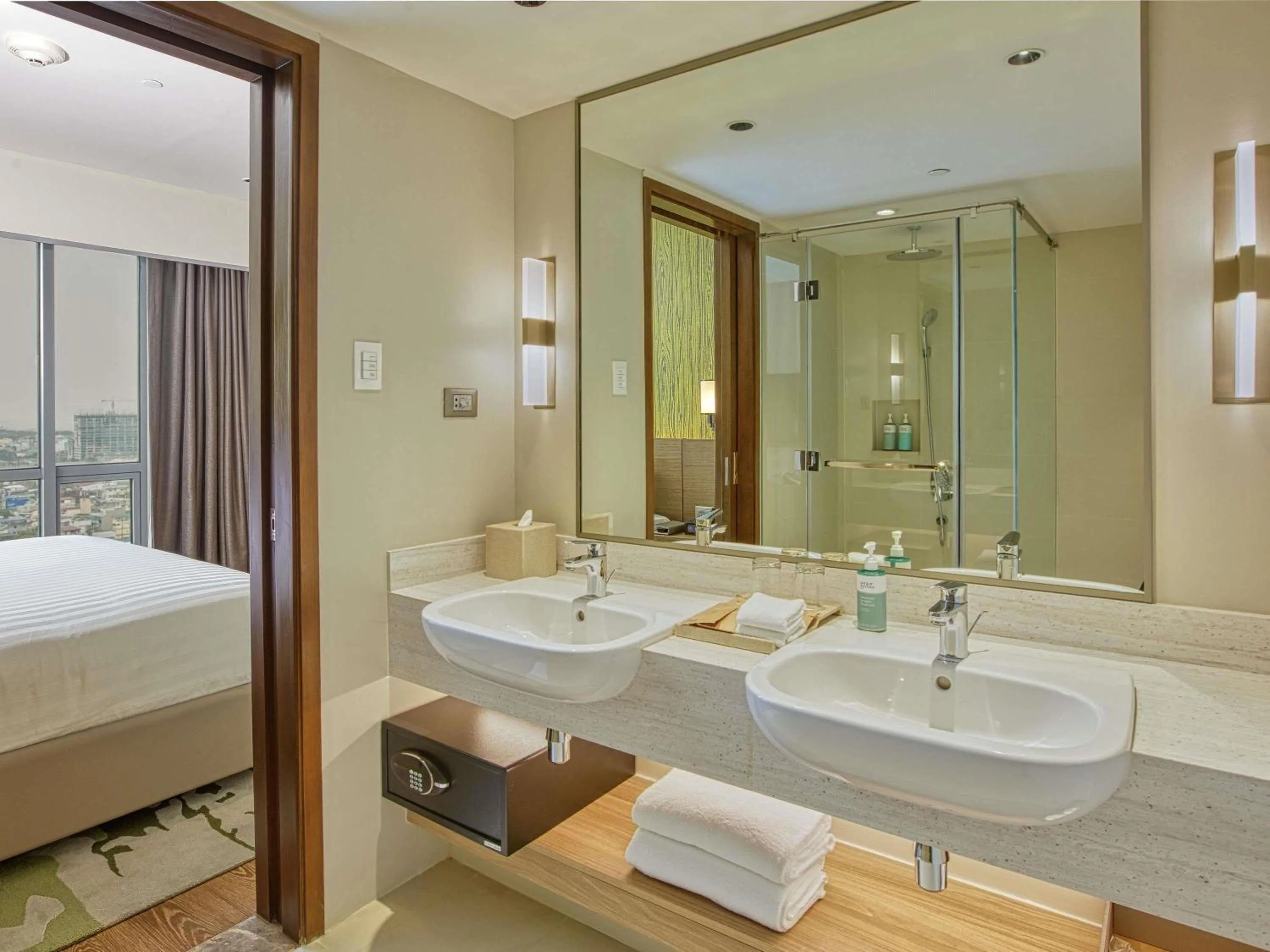 Bedroom in Novotel Suites Manila at Acqua