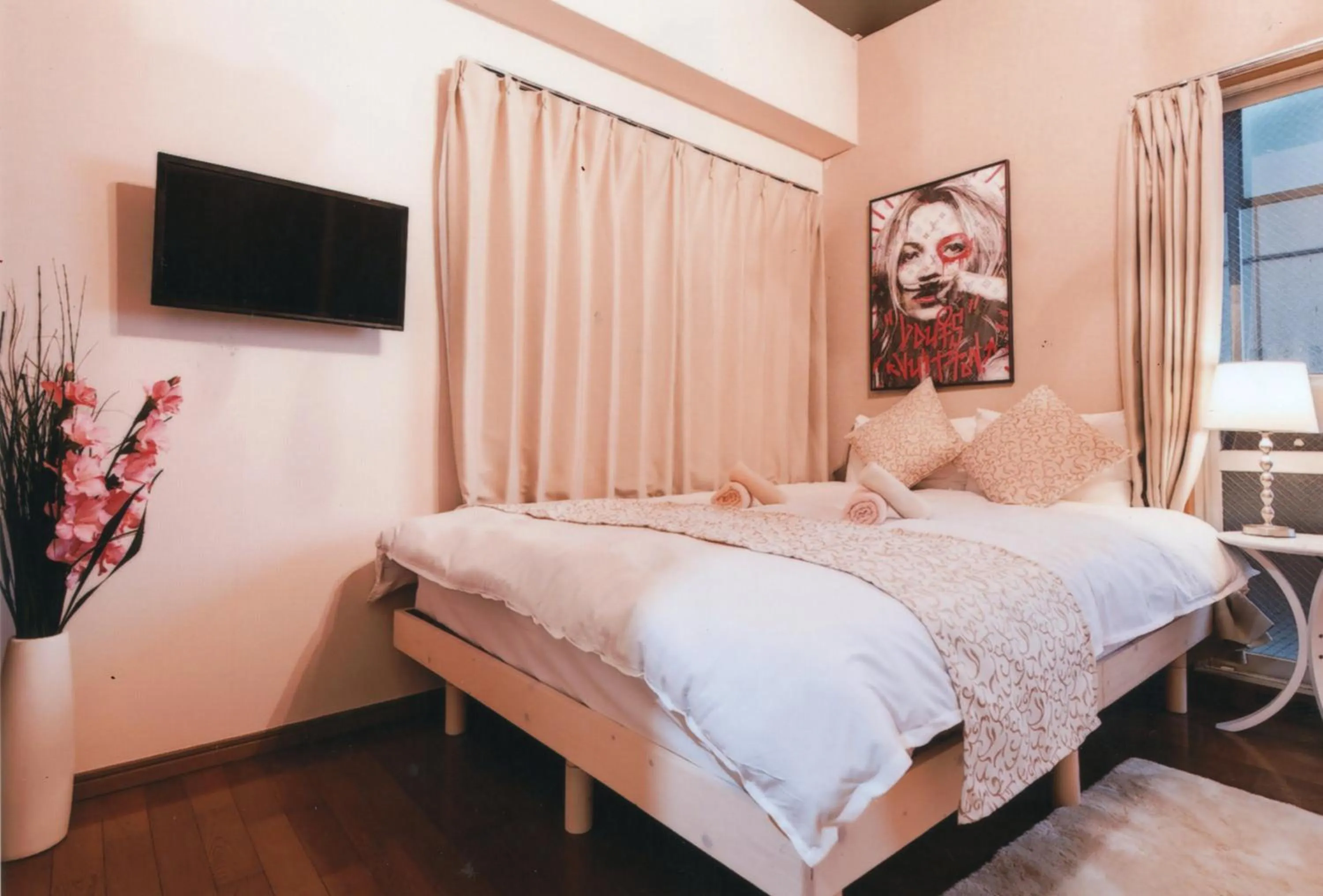 Bed in Sakura Sands Hotel