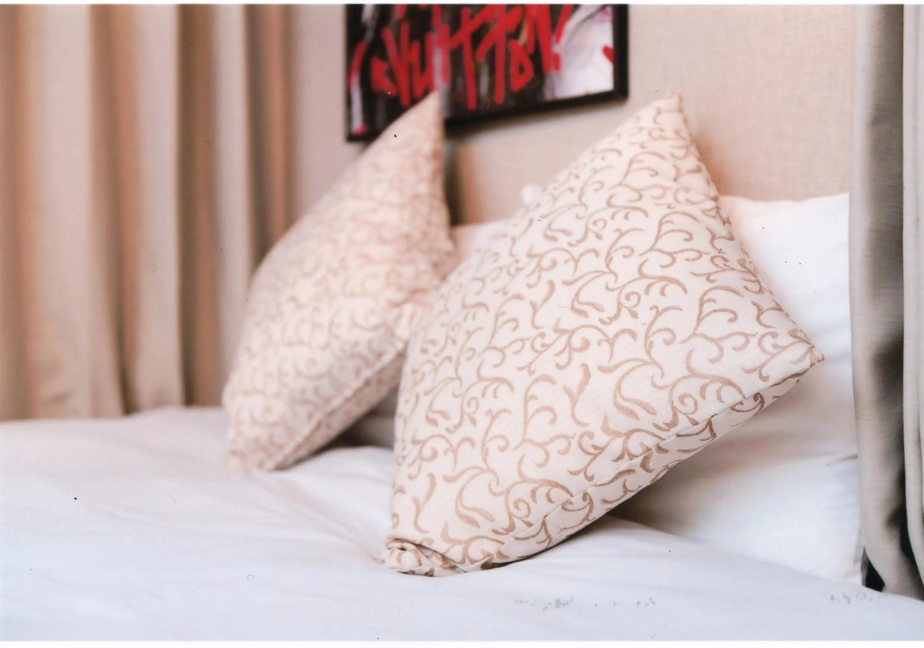 Bed in Sakura Sands Hotel