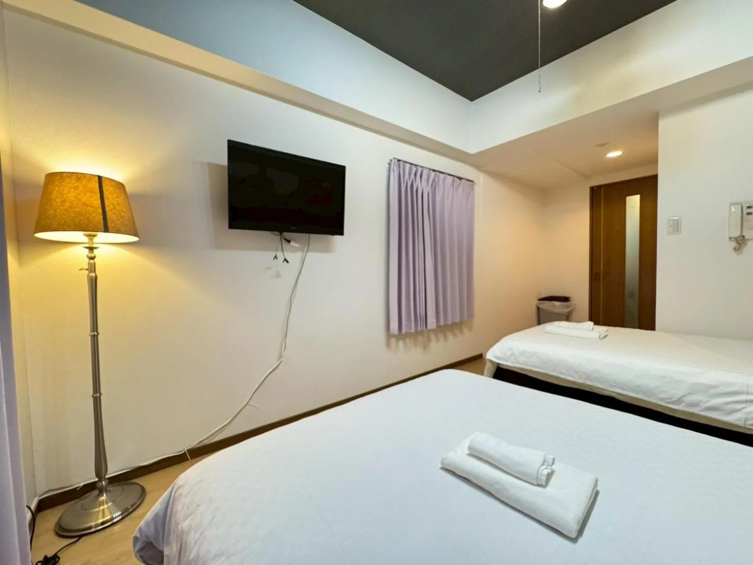 Bed in Sakura Sands Hotel