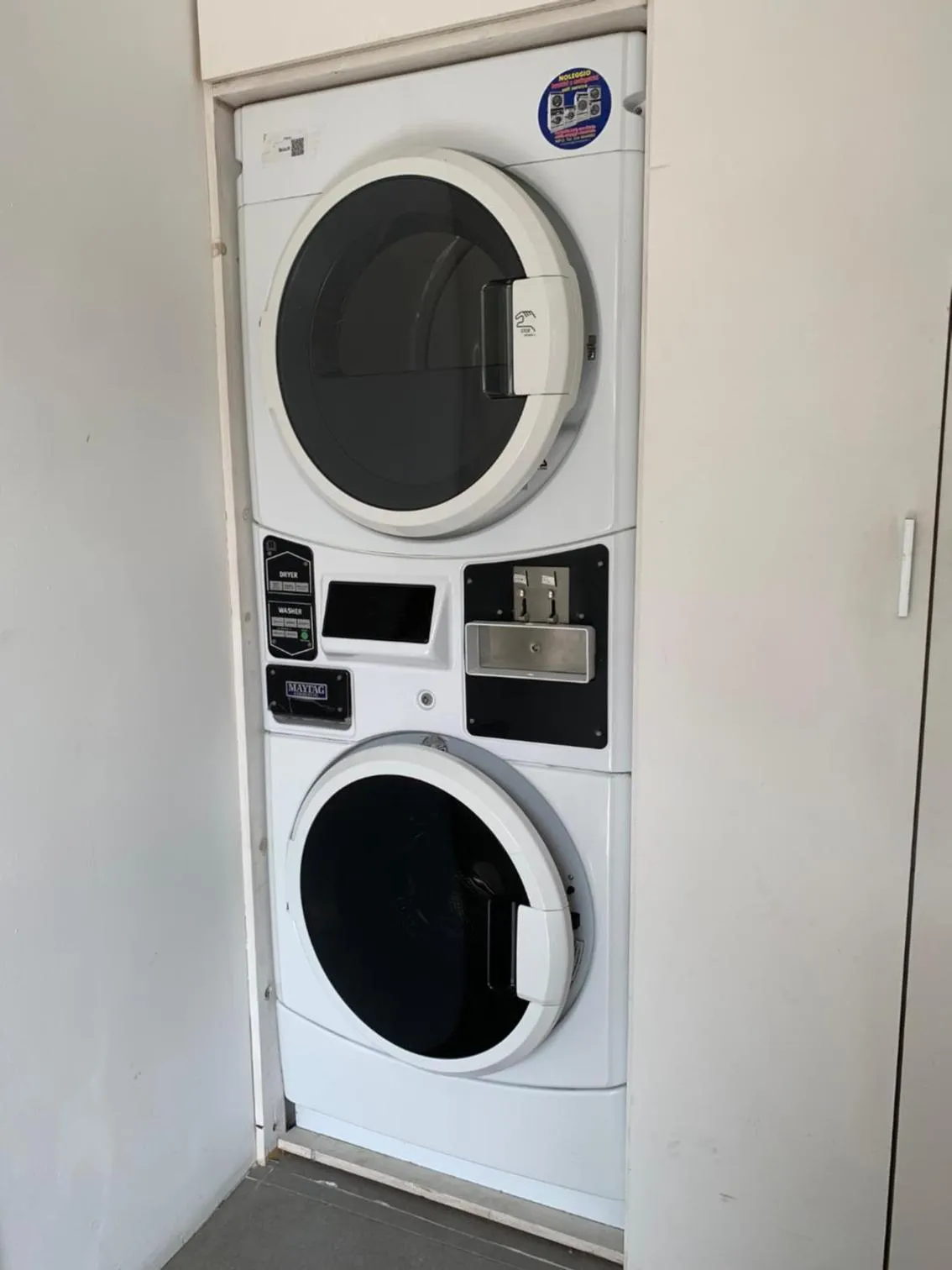washing machine in Amare Suite & Apartments