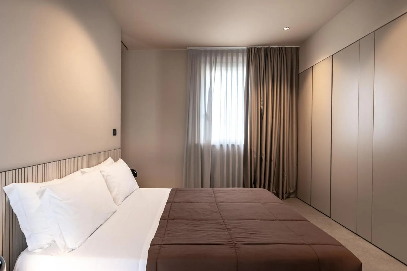 Bed in Amare Suite & Apartments