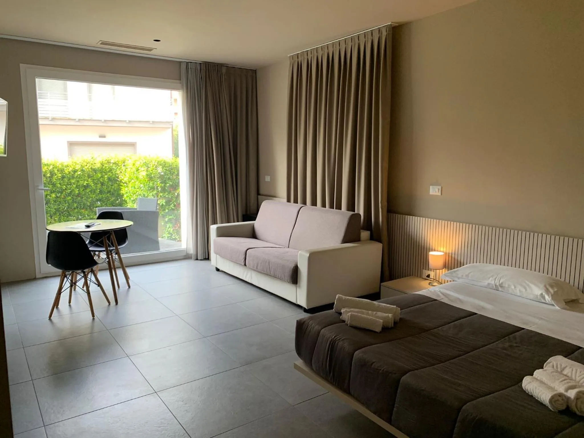 Bed in Amare Suite & Apartments