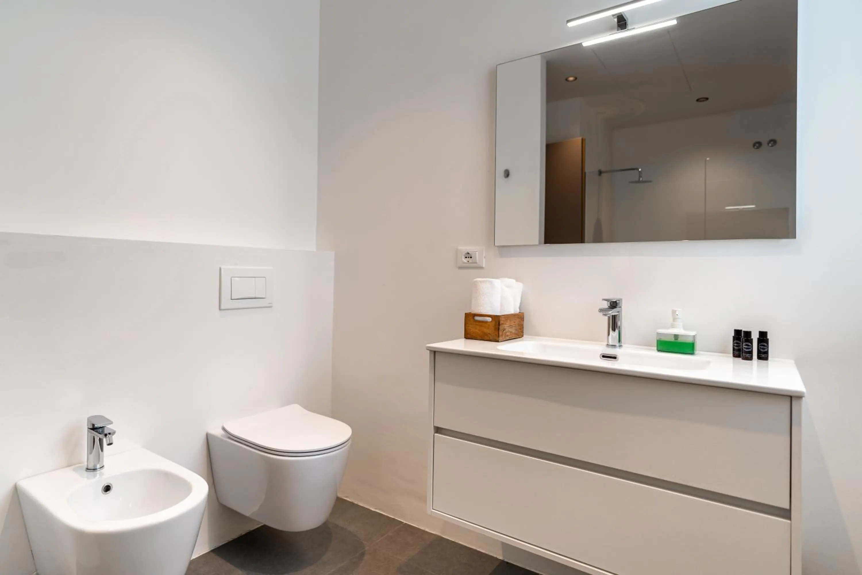 Toilet in Amare Suite & Apartments