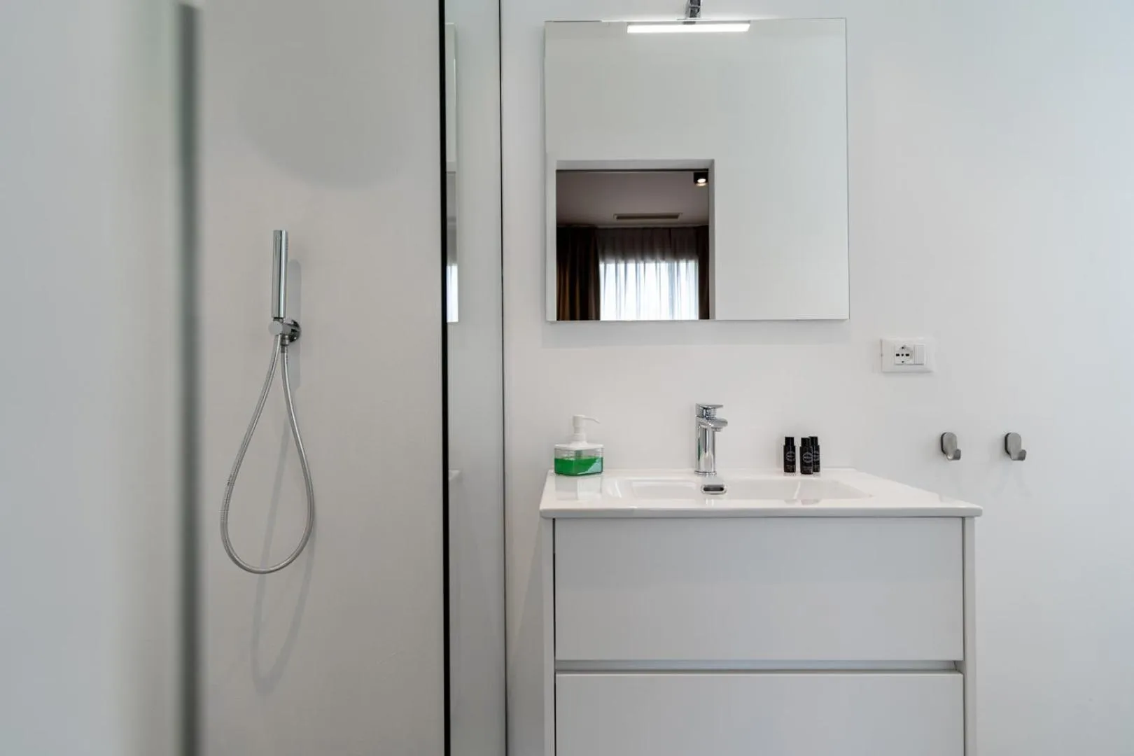 Bathroom in Amare Suite & Apartments