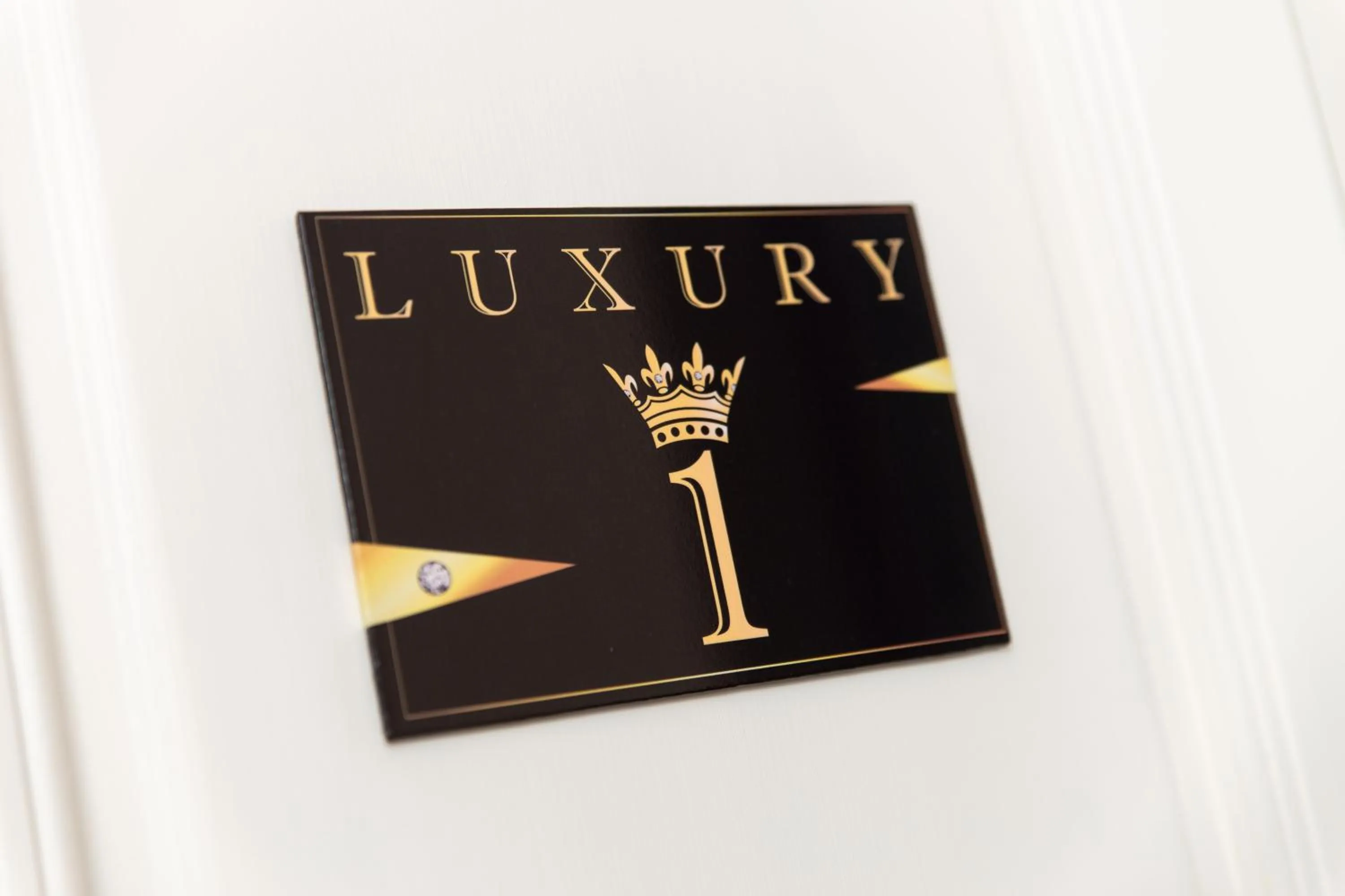 Property logo or sign in Luxury Number 1 Apartments