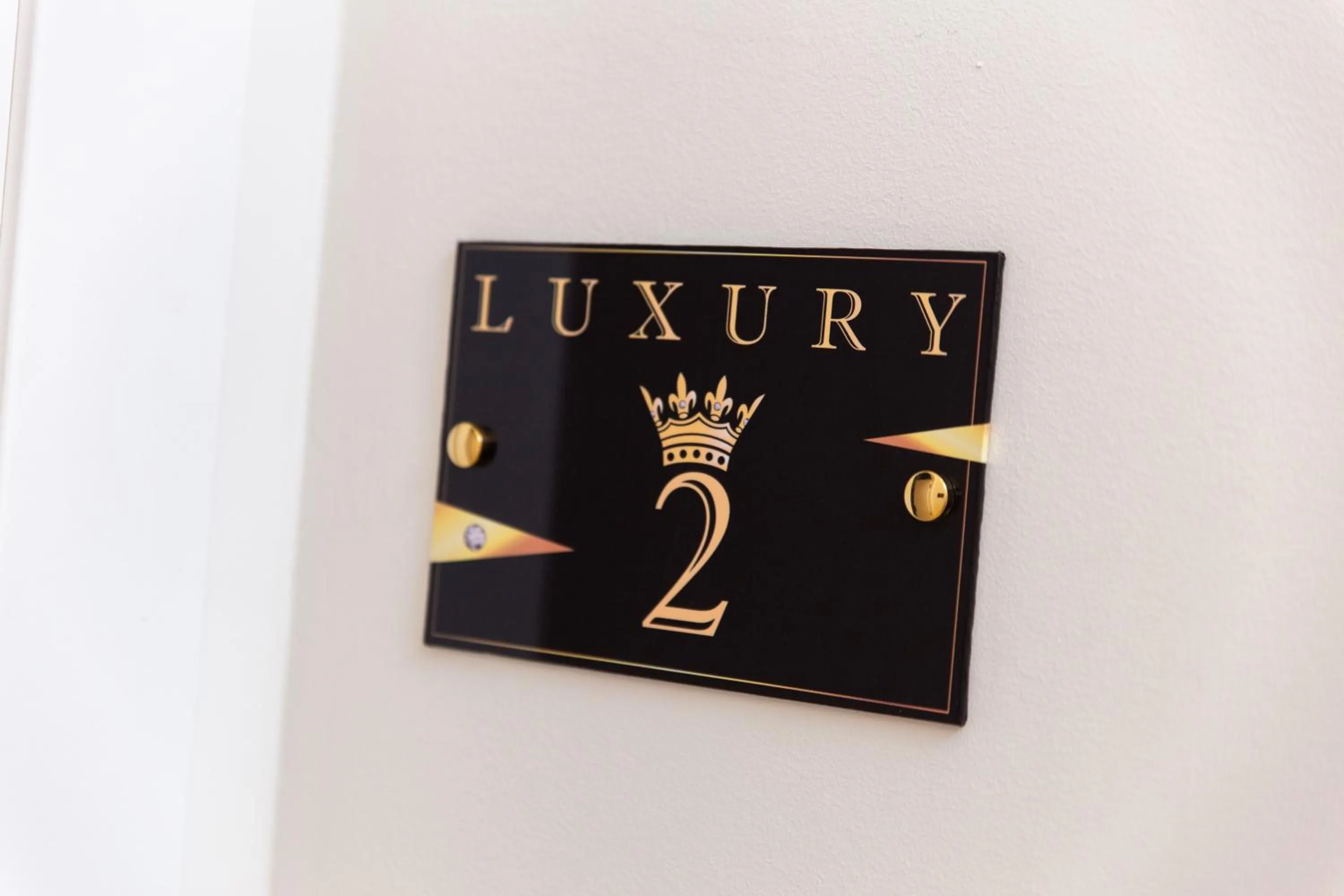 Property logo or sign in Luxury Number 1 Apartments