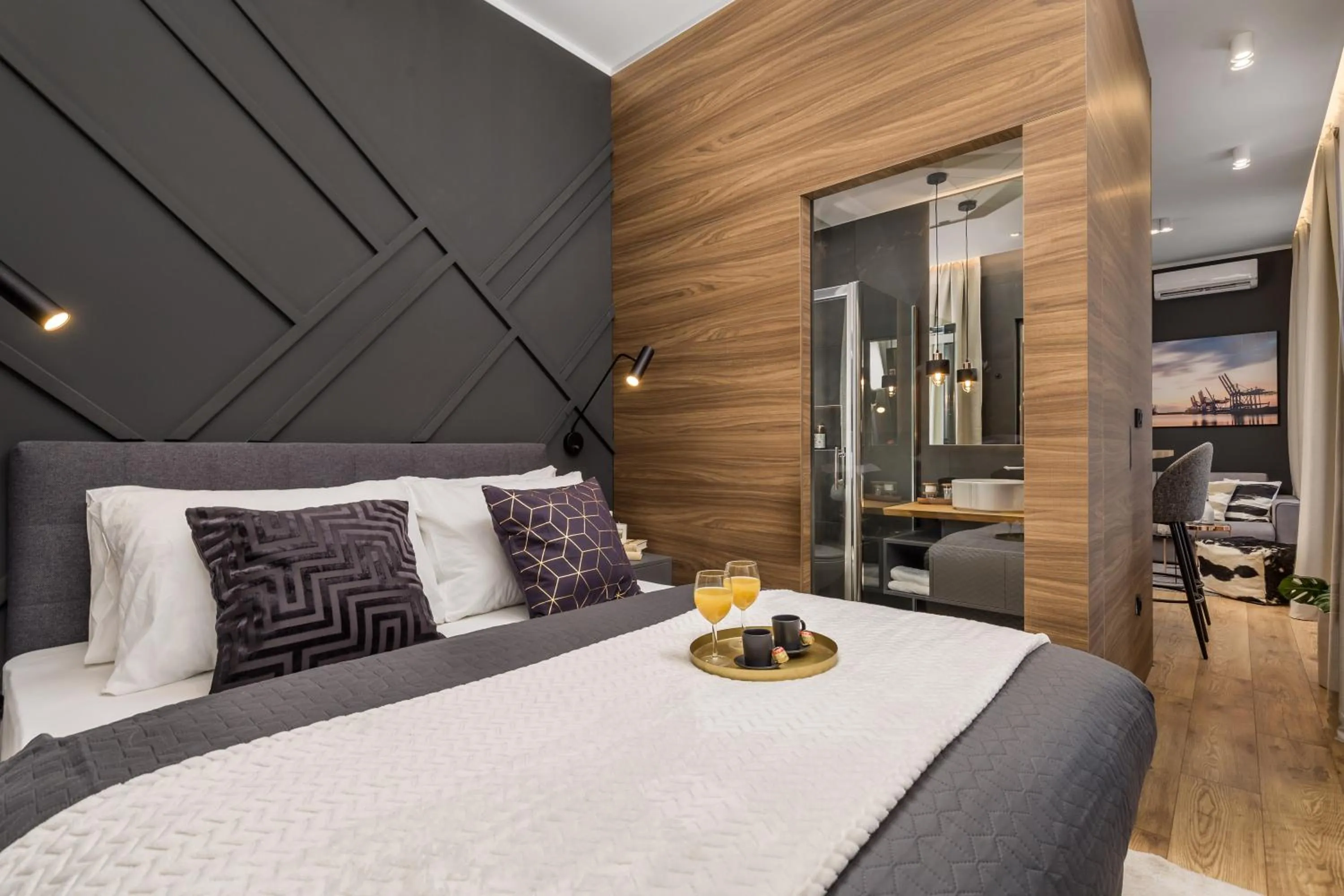 Bed in Luxury Number 1 Apartments