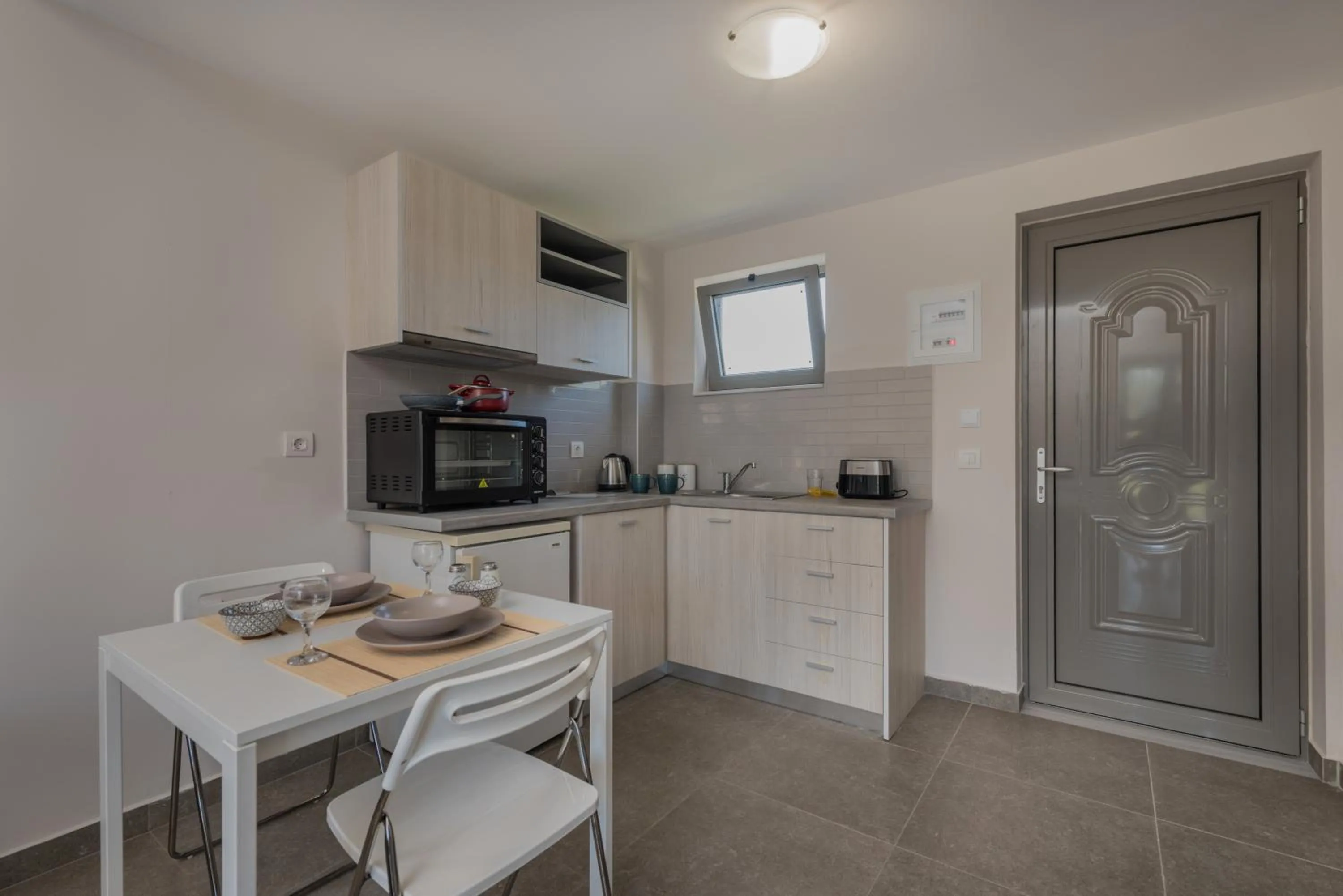 Kitchen or kitchenette in Casa 77 Zante by Karras Hotels
