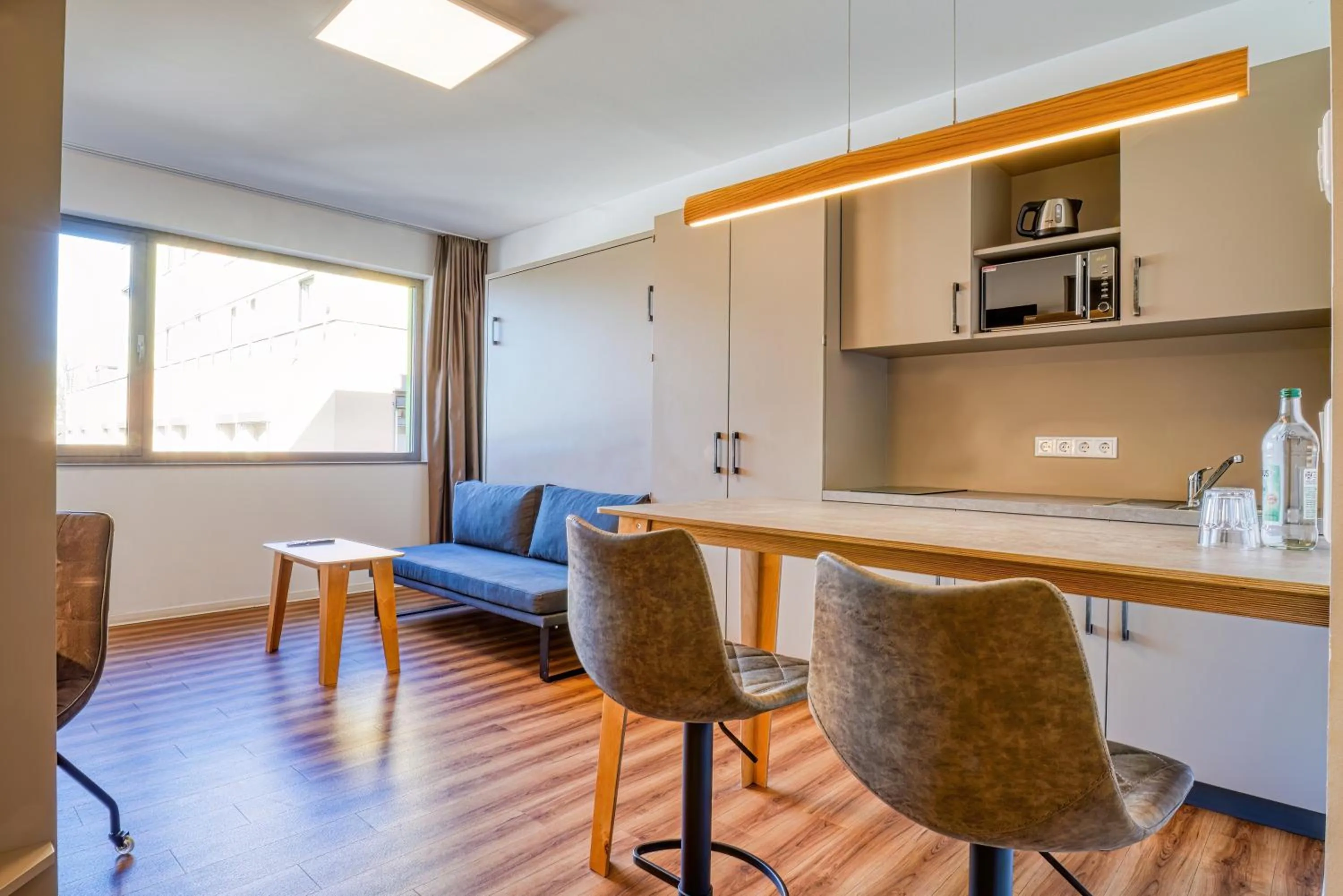 Kitchen or kitchenette in NiceToStay by Fairway Hotels