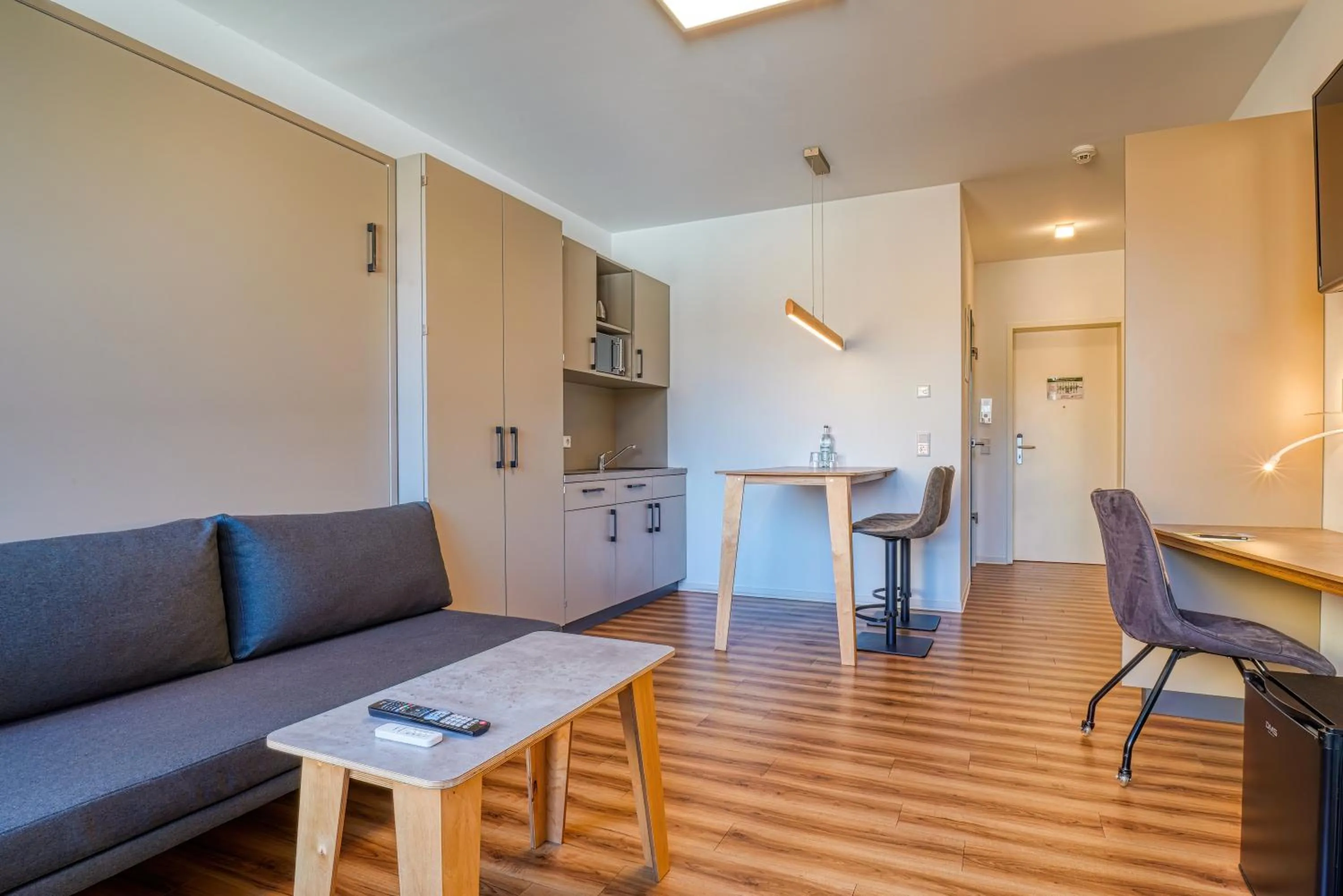 Kitchen or kitchenette in NiceToStay by Fairway Hotels