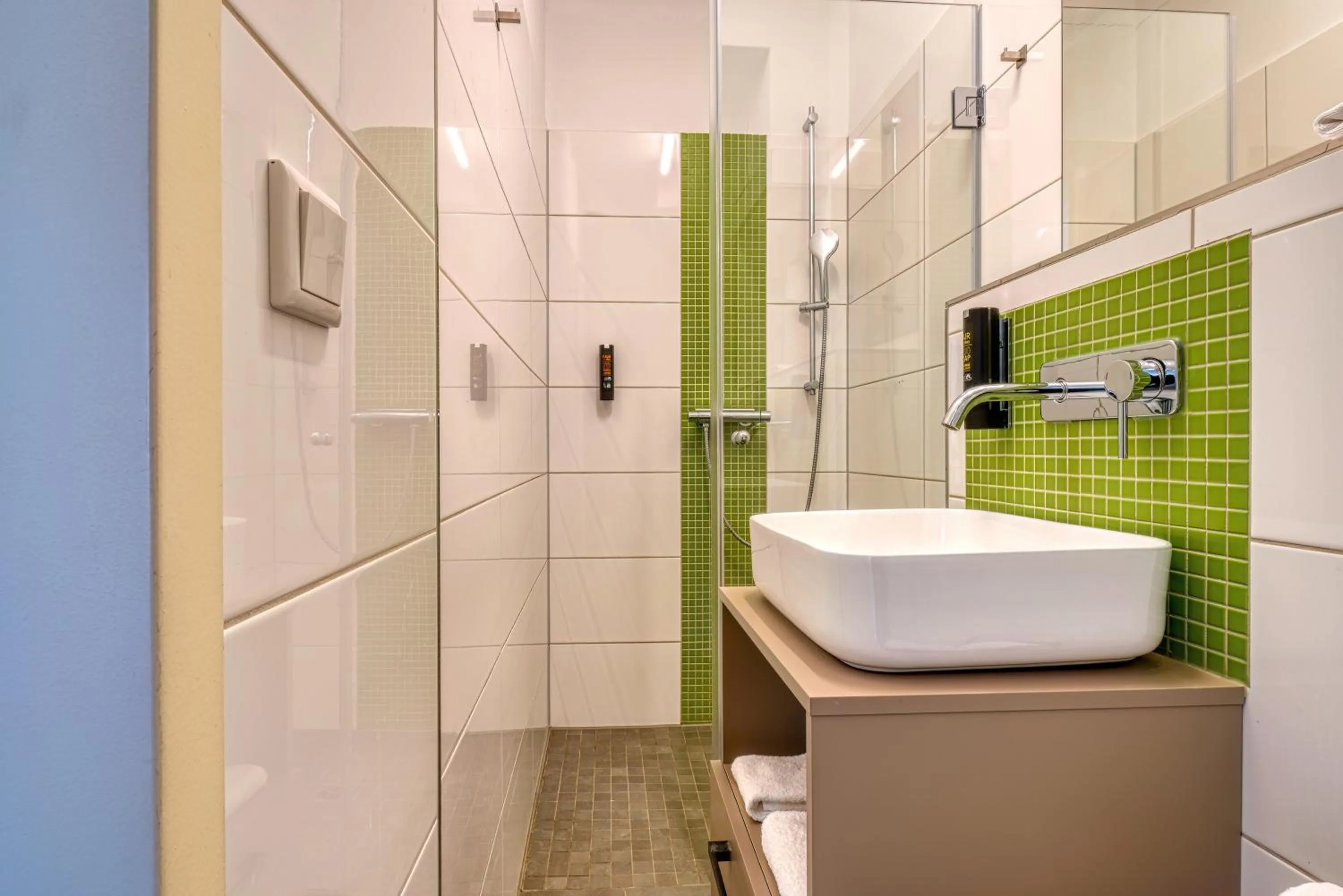 Bathroom in NiceToStay by Fairway Hotels