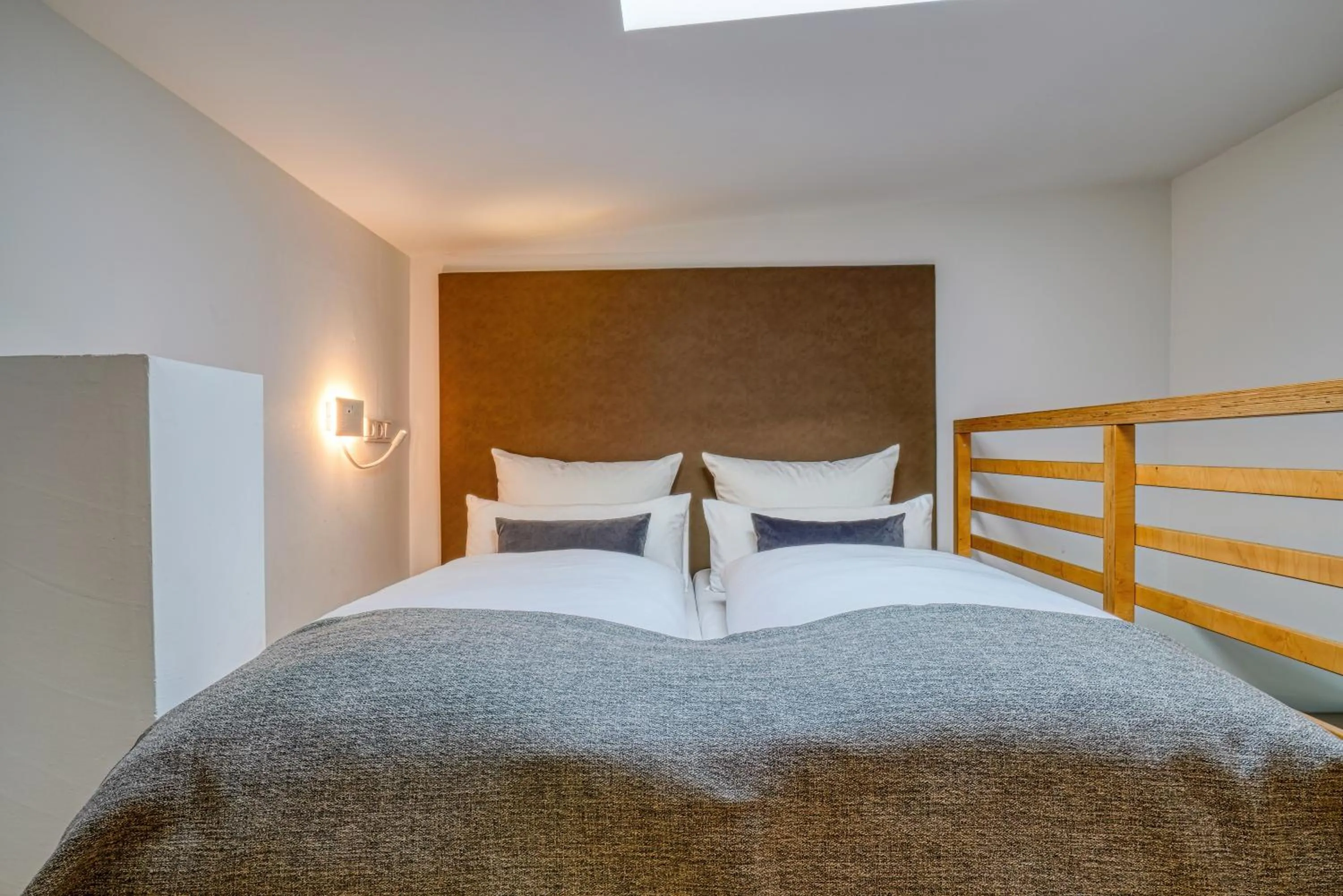 Bed in NiceToStay by Fairway Hotels