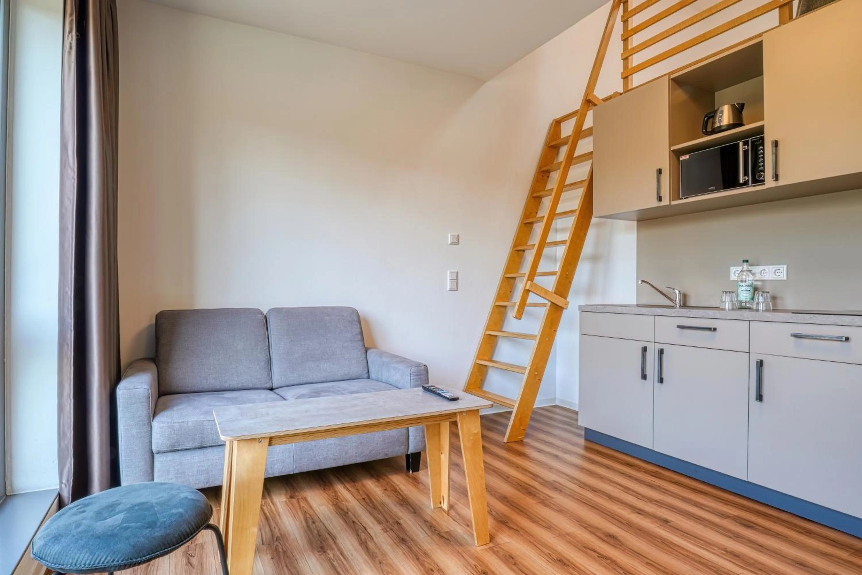 Kitchen or kitchenette in NiceToStay by Fairway Hotels