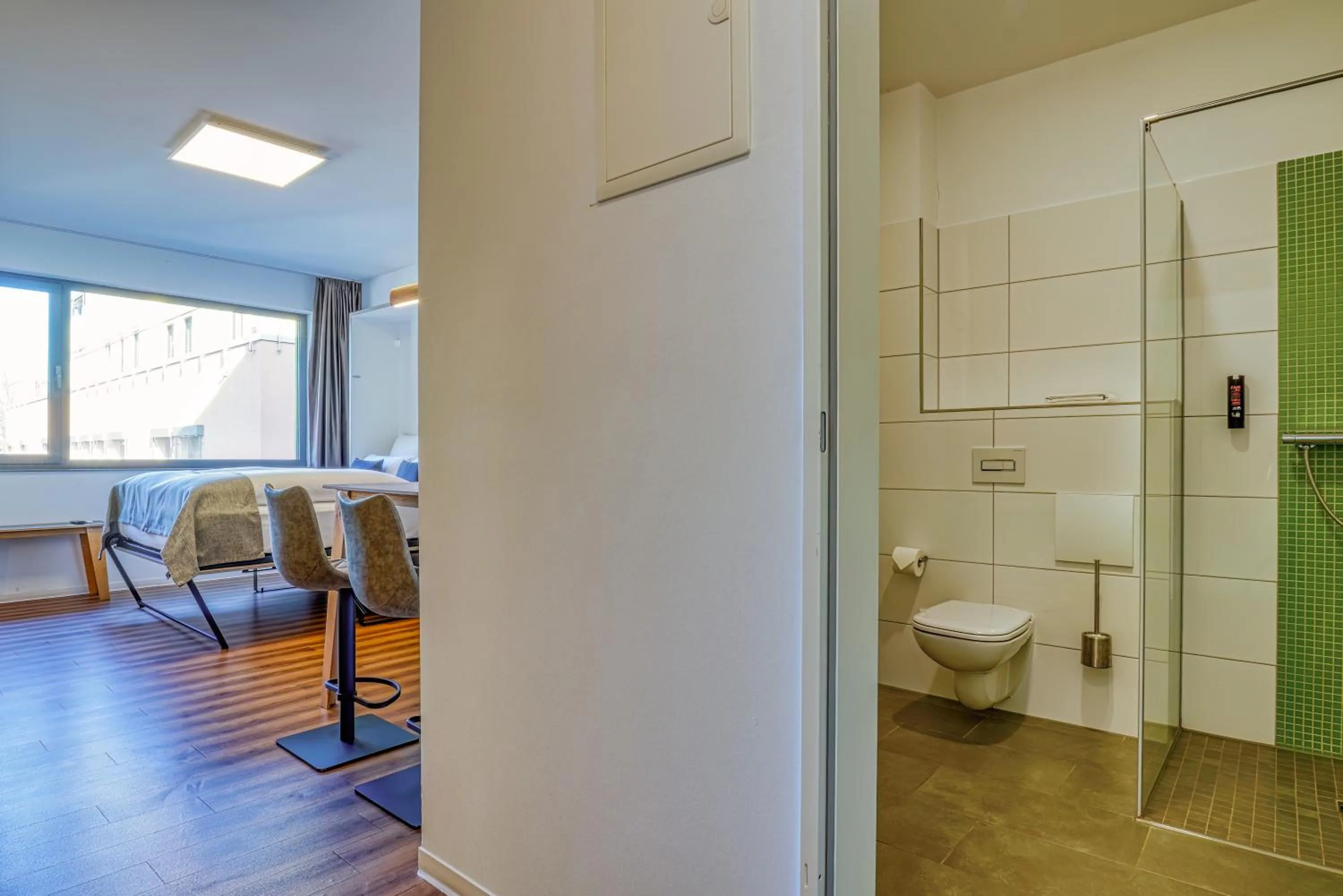 Shower in NiceToStay by Fairway Hotels