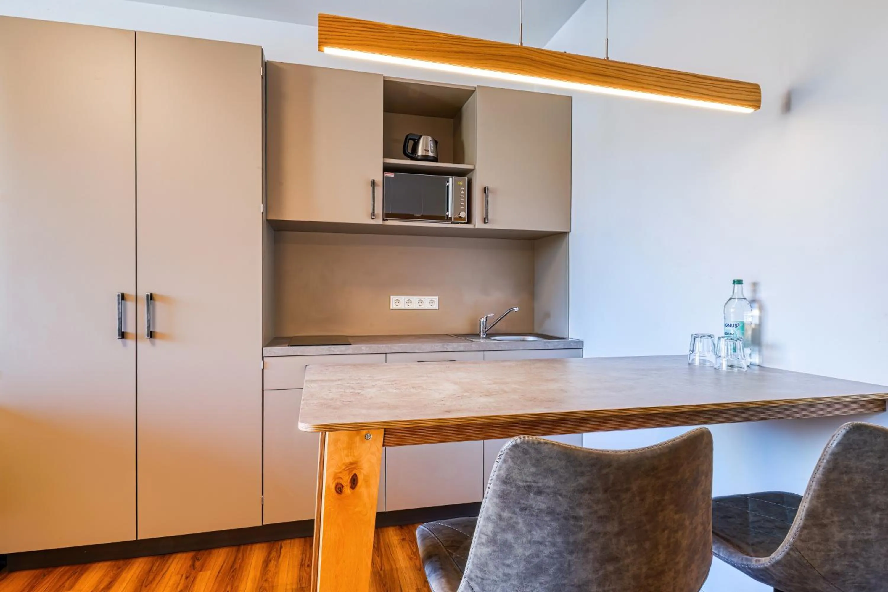 Dining area in NiceToStay by Fairway Hotels