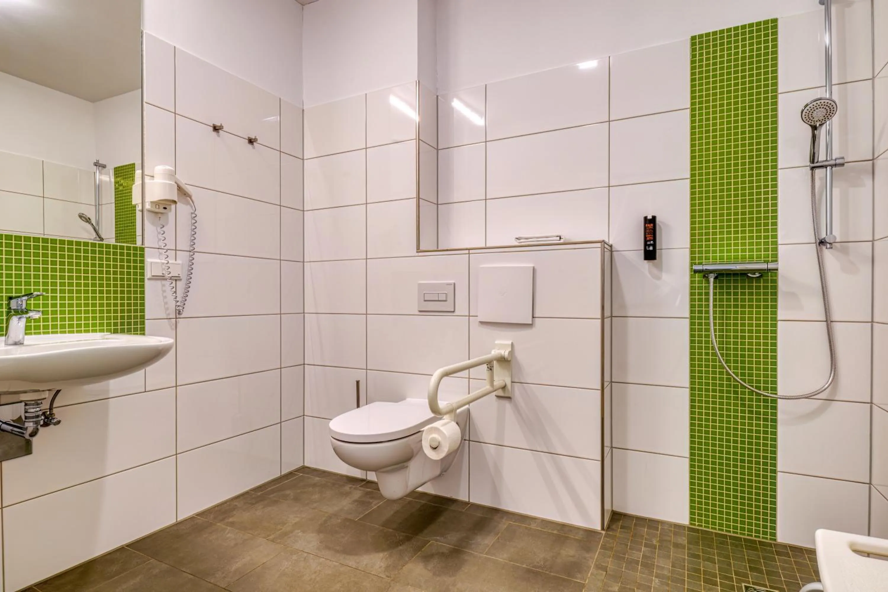 Shower in NiceToStay by Fairway Hotels