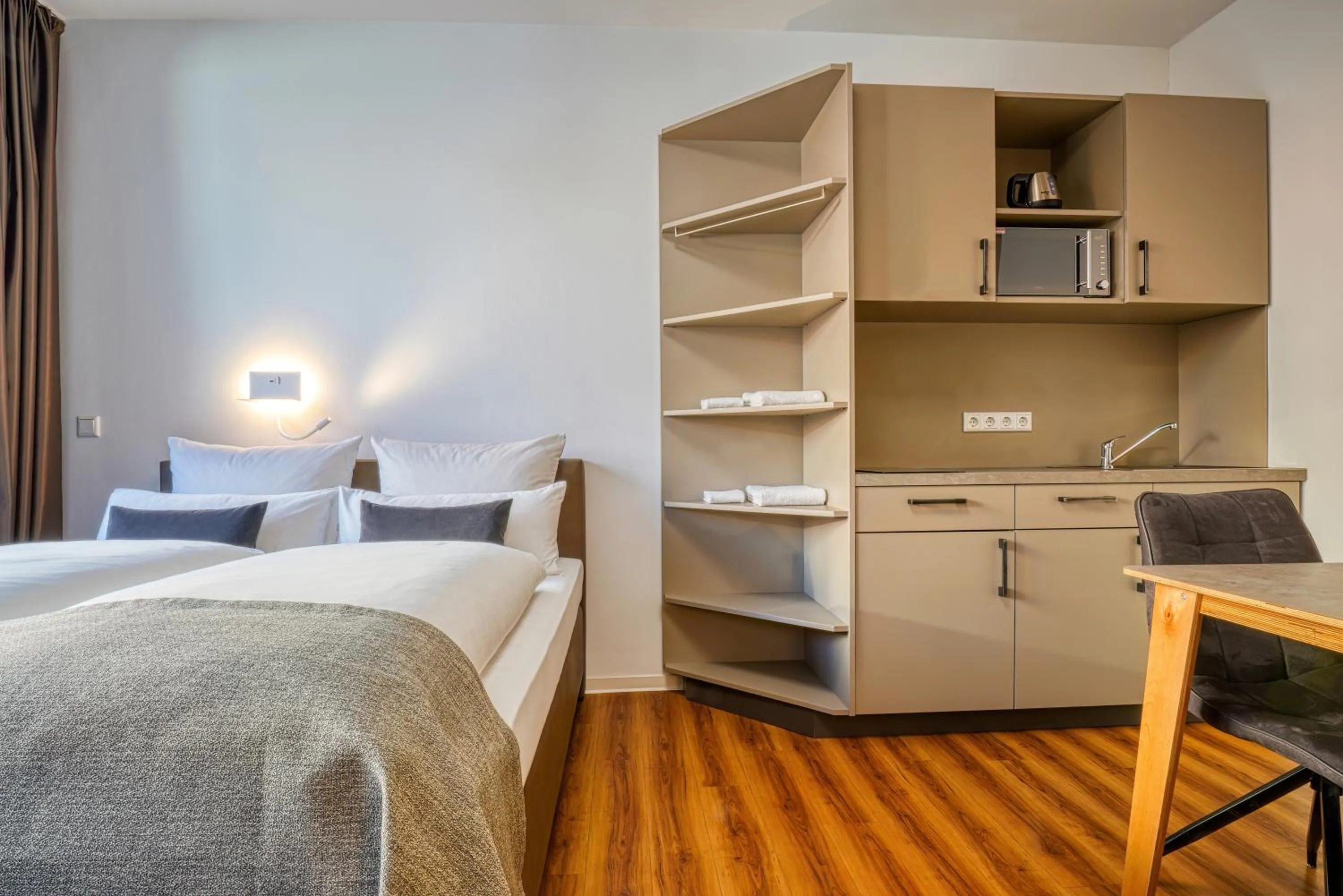 Bed in NiceToStay by Fairway Hotels