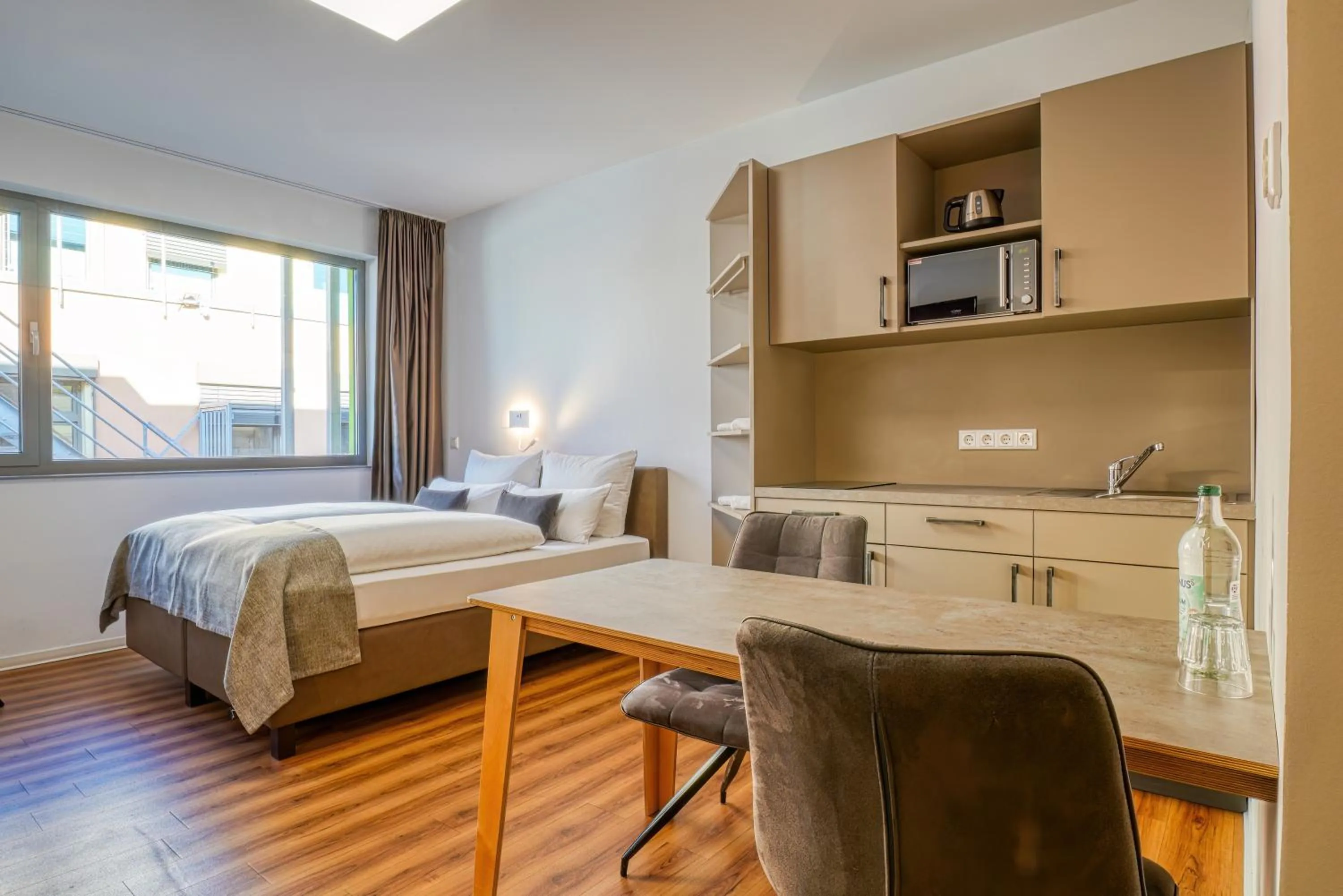 Bed in NiceToStay by Fairway Hotels