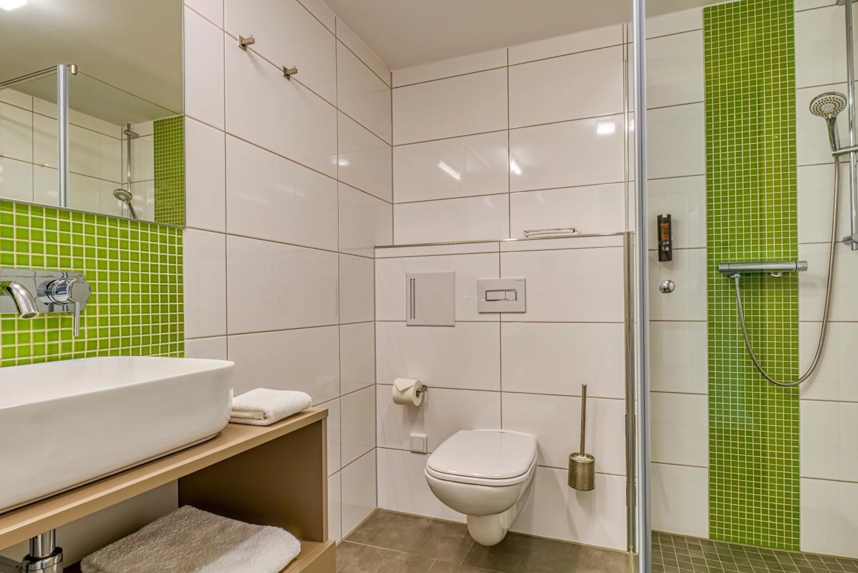 Shower in NiceToStay by Fairway Hotels