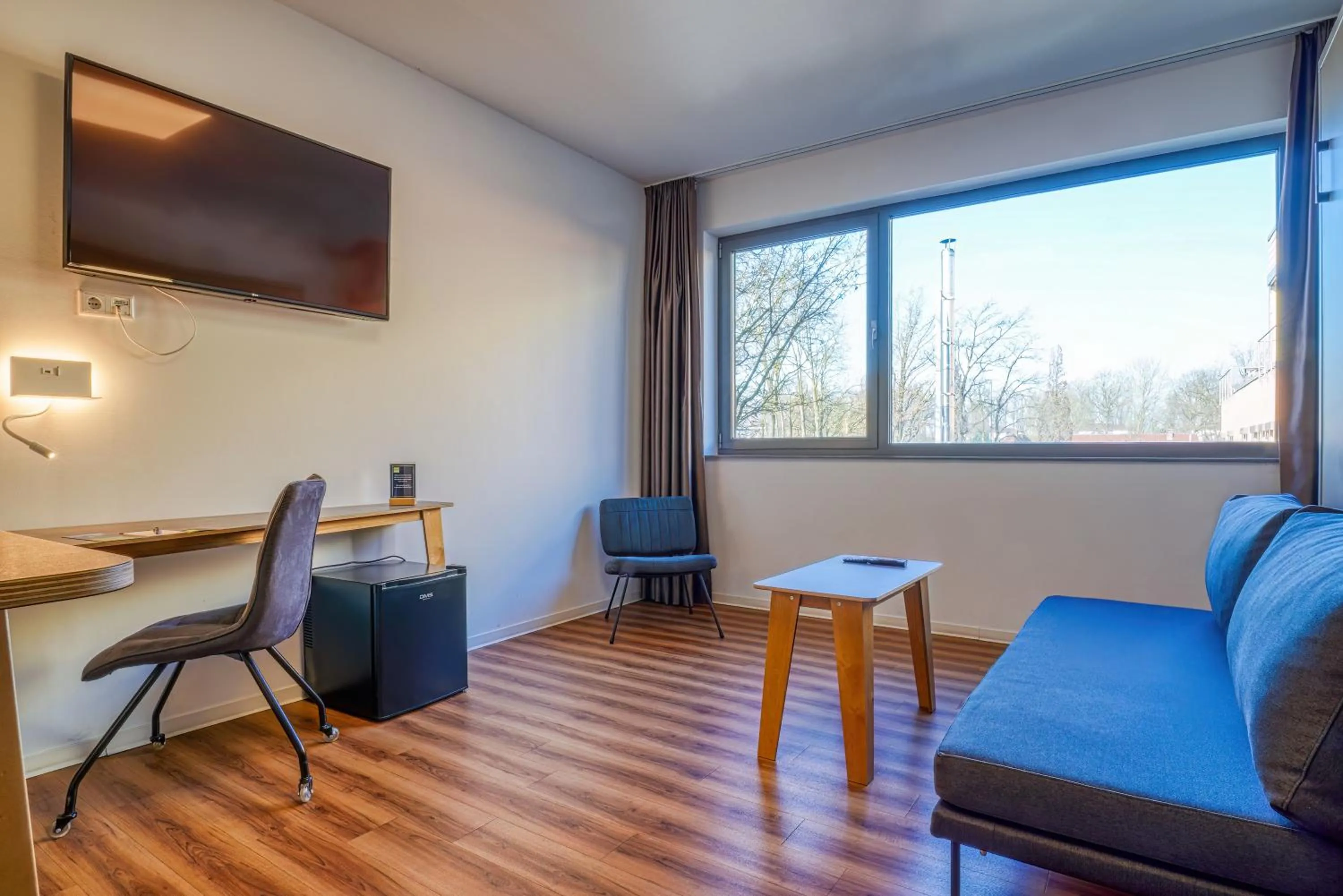 TV and multimedia in NiceToStay by Fairway Hotels